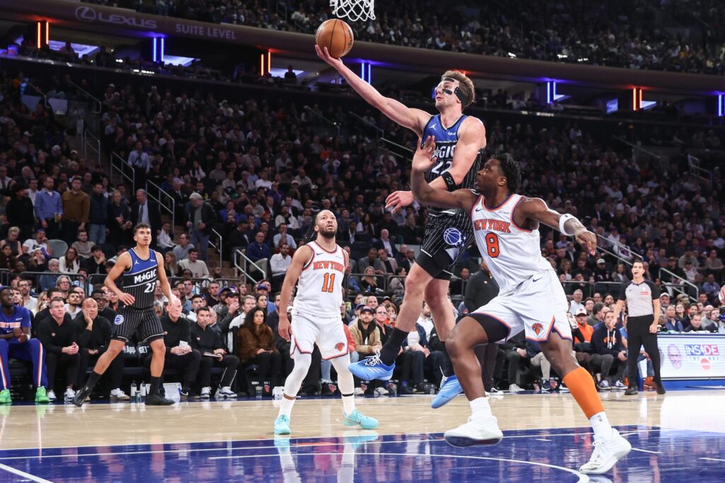 Orlando Magic forward Franz Wagner (22) drives past New York Knicks forward OG Anunoby (8) in the third quarter at Madison Square Garden.