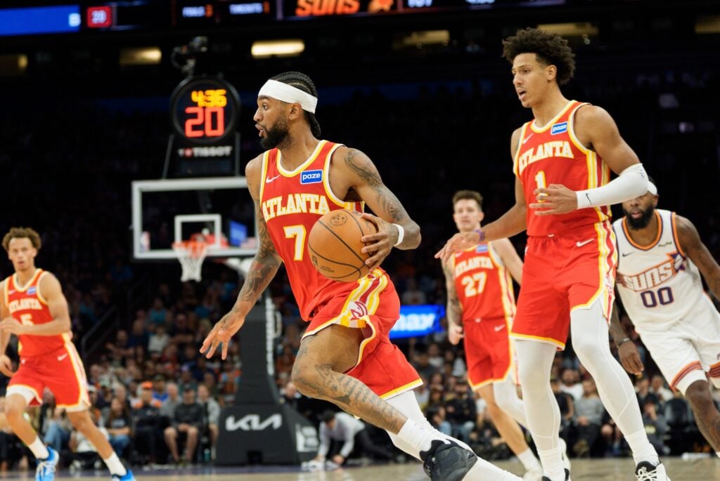 Atlanta Hawks guard Nickeil Alexander-Walker (7) drives against the Phoenix Suns during the second half of play at Mortgage Matchup Center.