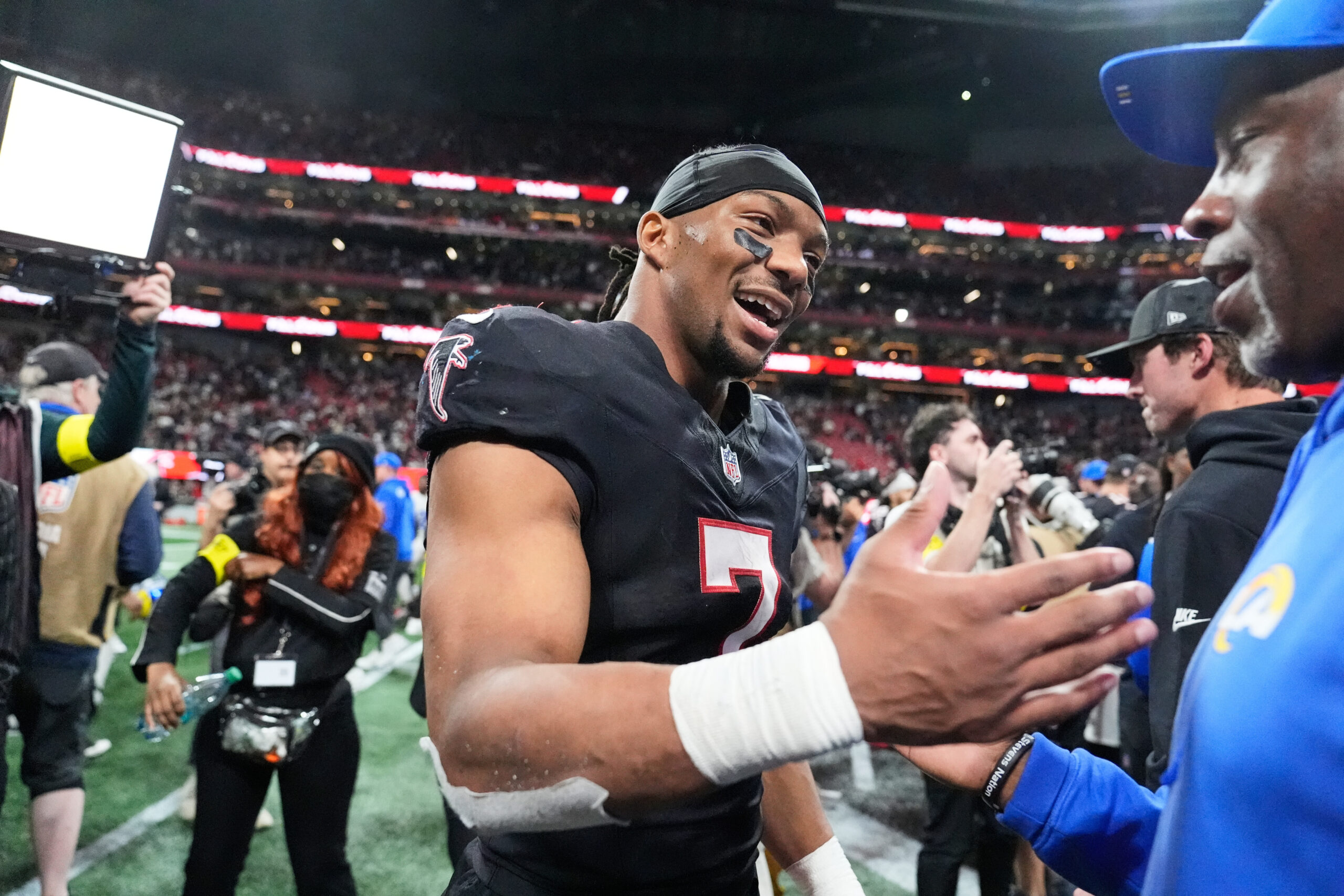 Atlanta Falcons running back Bijan Robinson (7) celebrates after an...