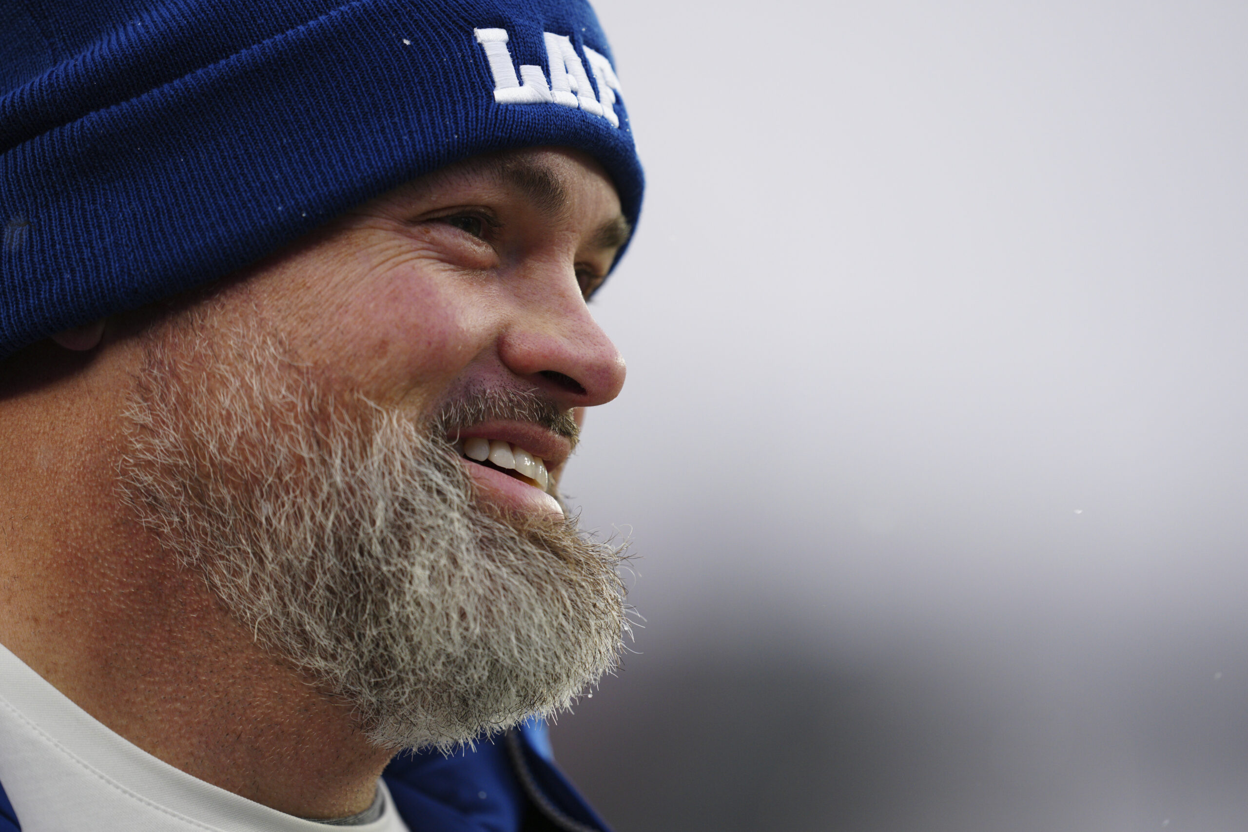 Former NFL player Andrew Whitworth walks the sidelines before an...