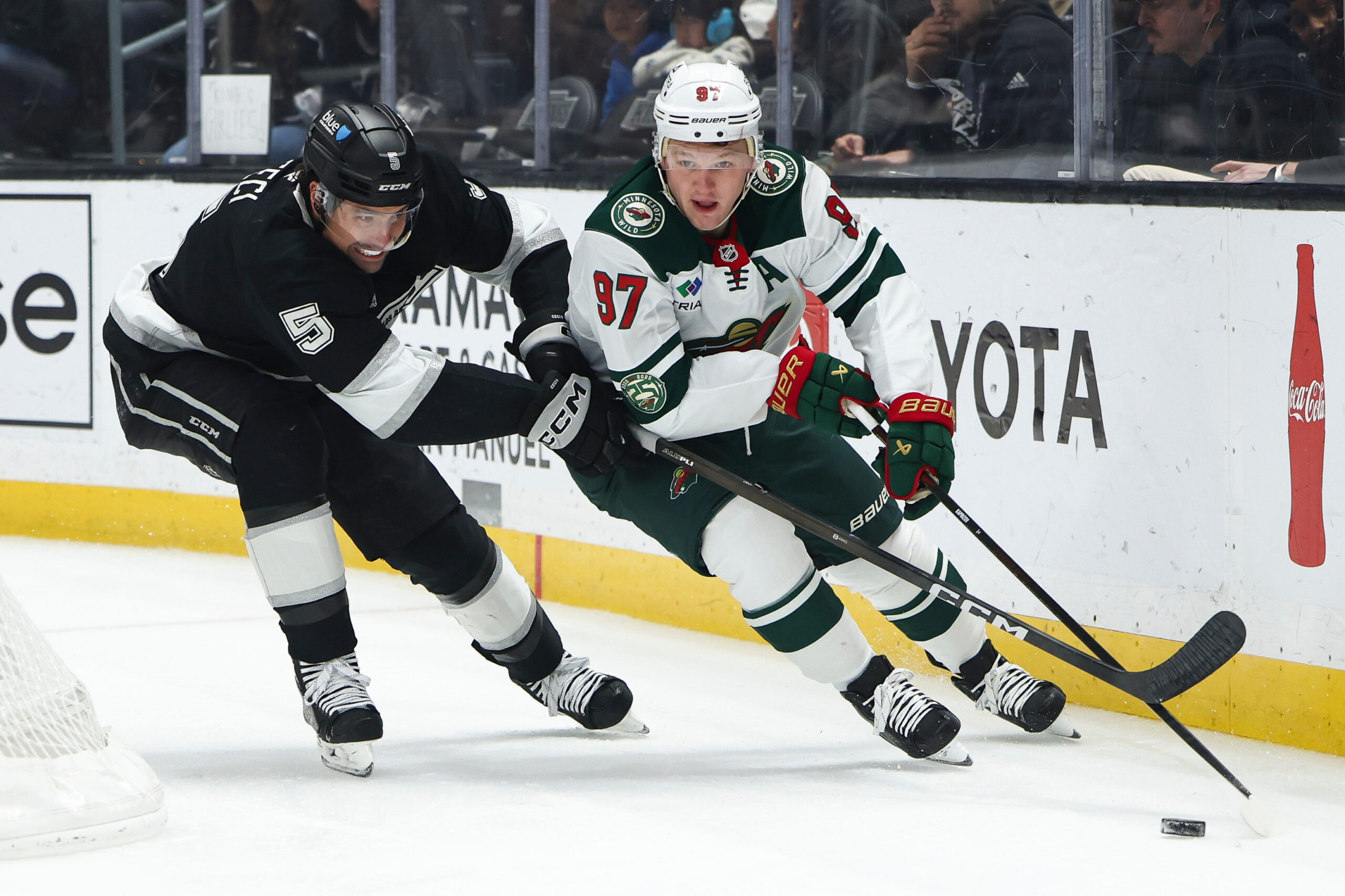 Minnesota Wild left wing Kirill Kaprizov (97) and Kings defenseman...