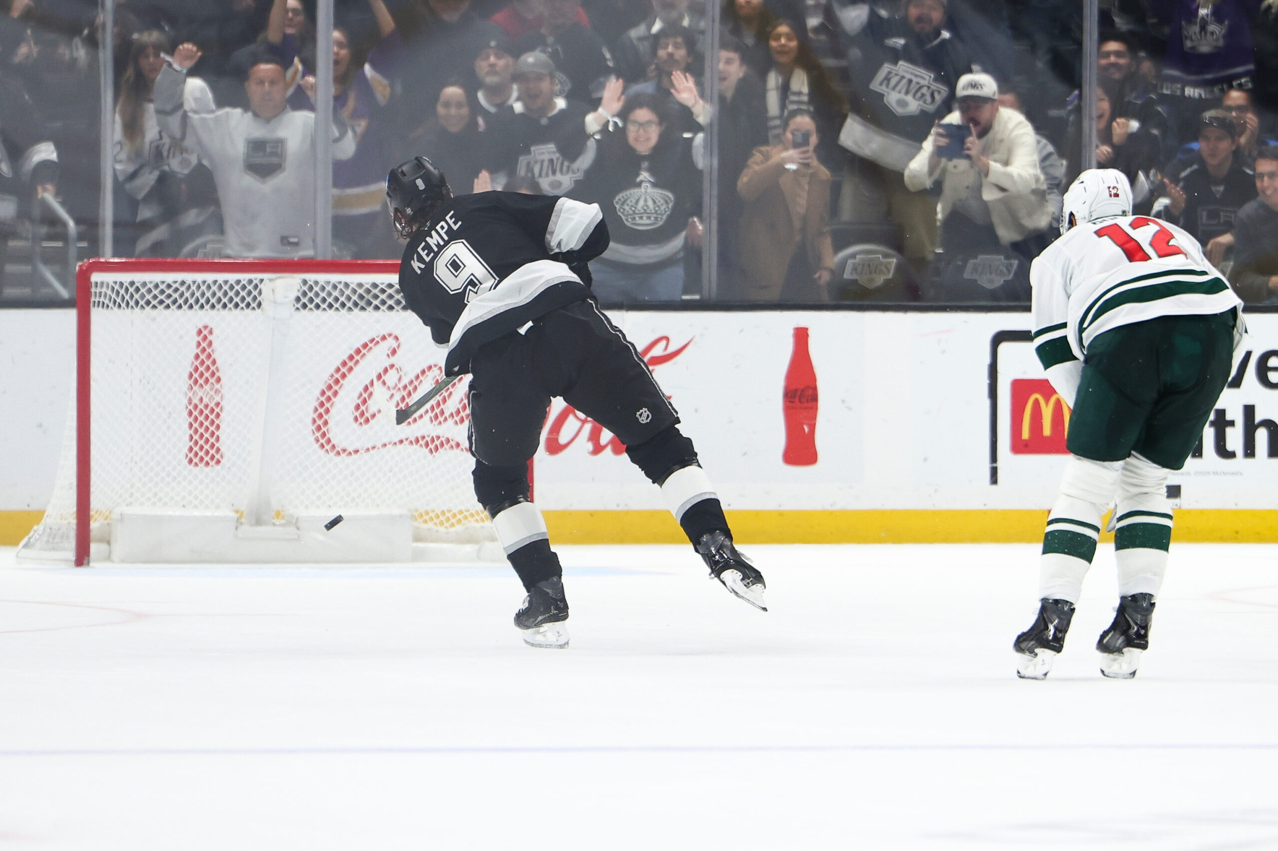 Kings right wing Adrian Kempe (9) scores a goal as...