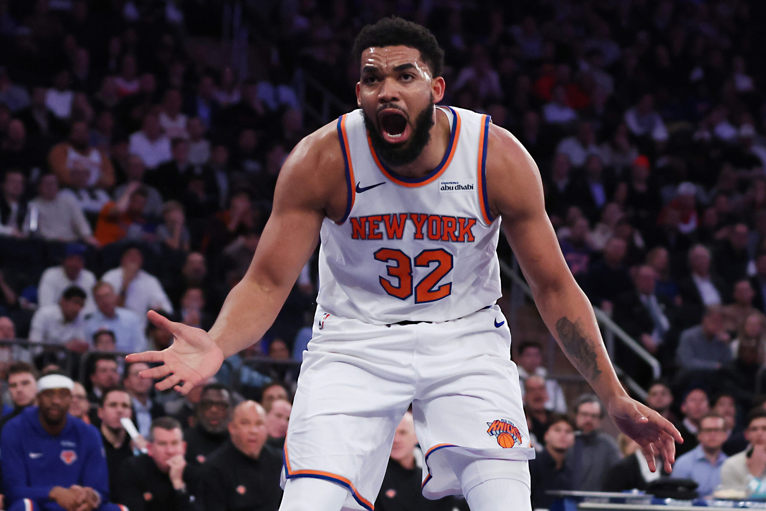 New York Knicks center Karl-Anthony Towns reacts to not getting...