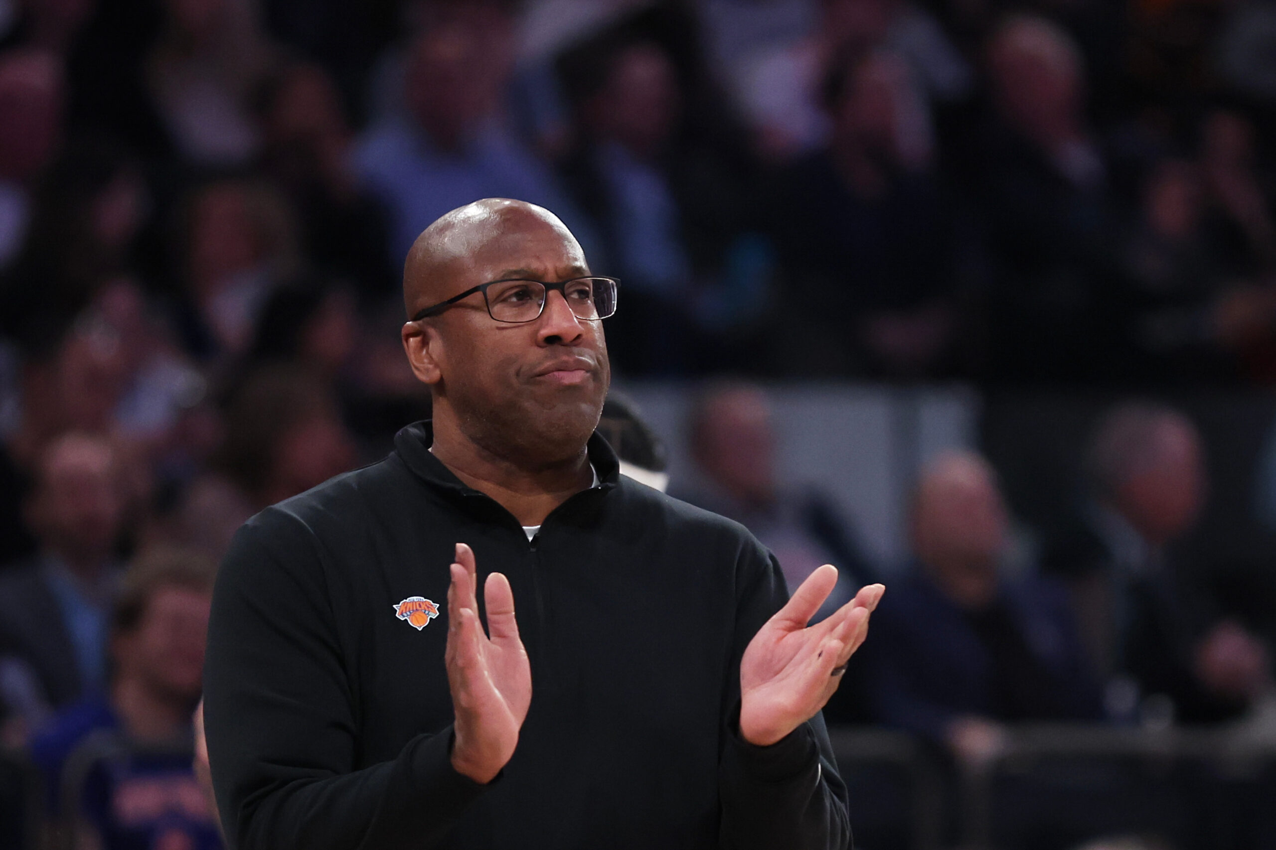 New York Knicks head coach Mike Brown claps on the...