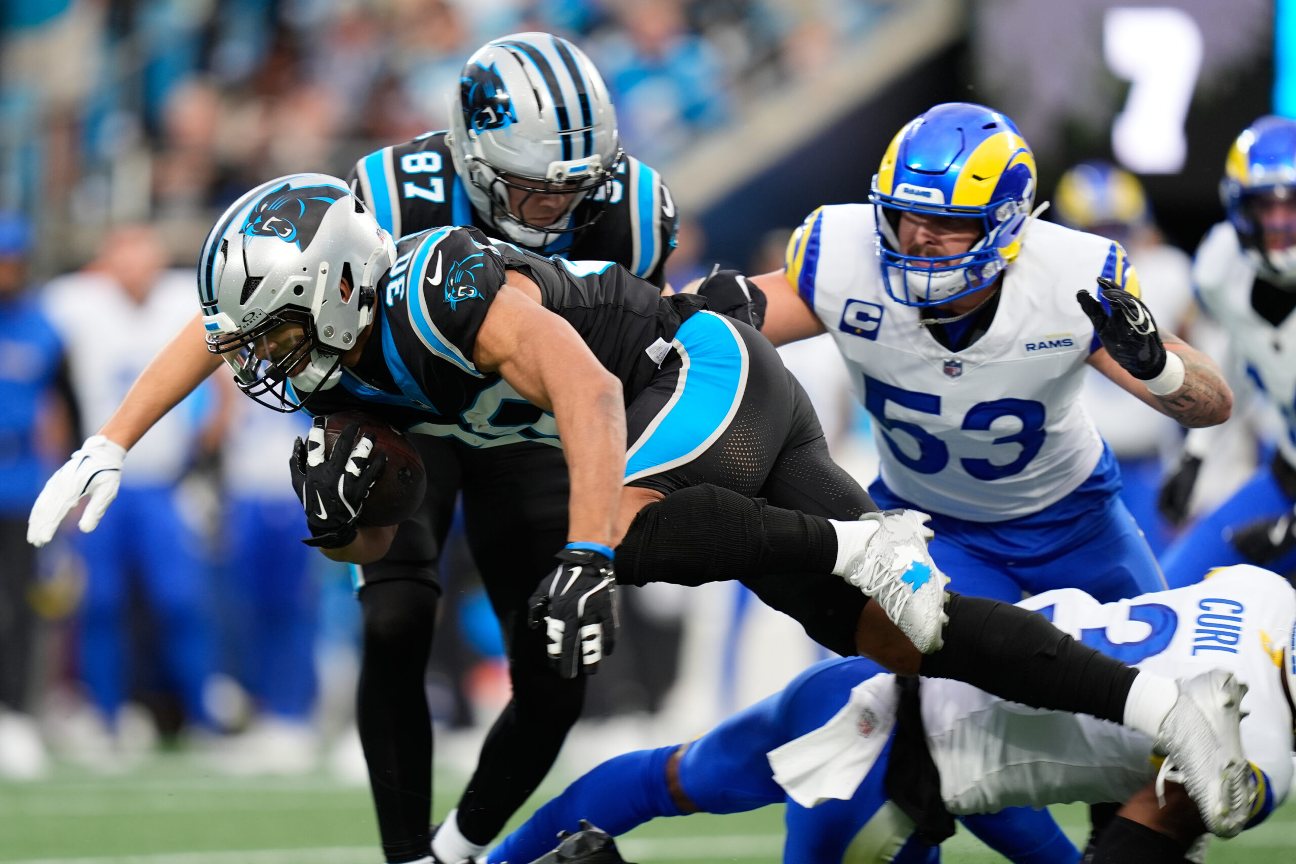 Carolina Panthers running back Chuba Hubbard (30) lunges for a...