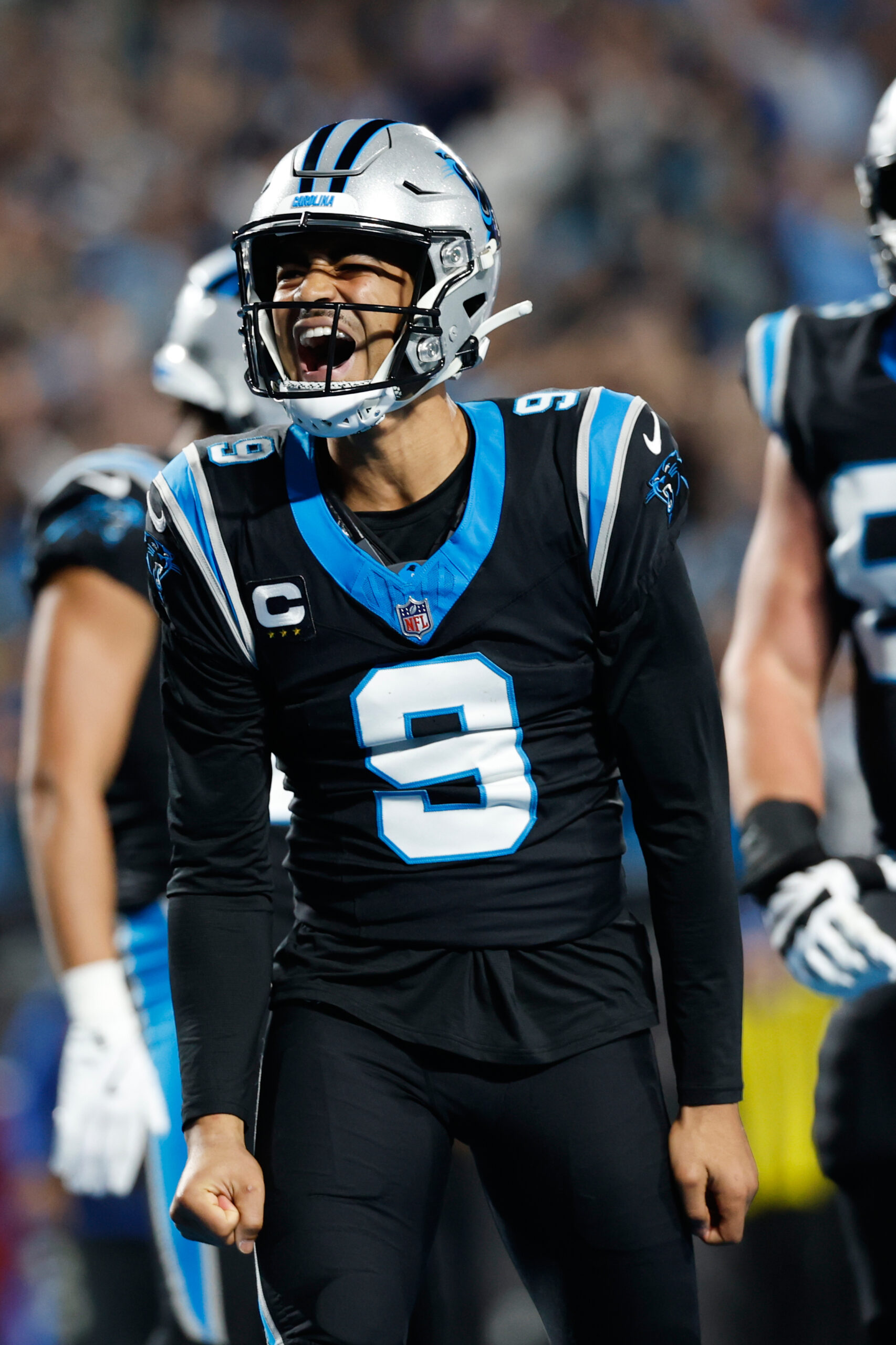 Carolina Panthers quarterback Bryce Young (9) celebrates after scoring a...