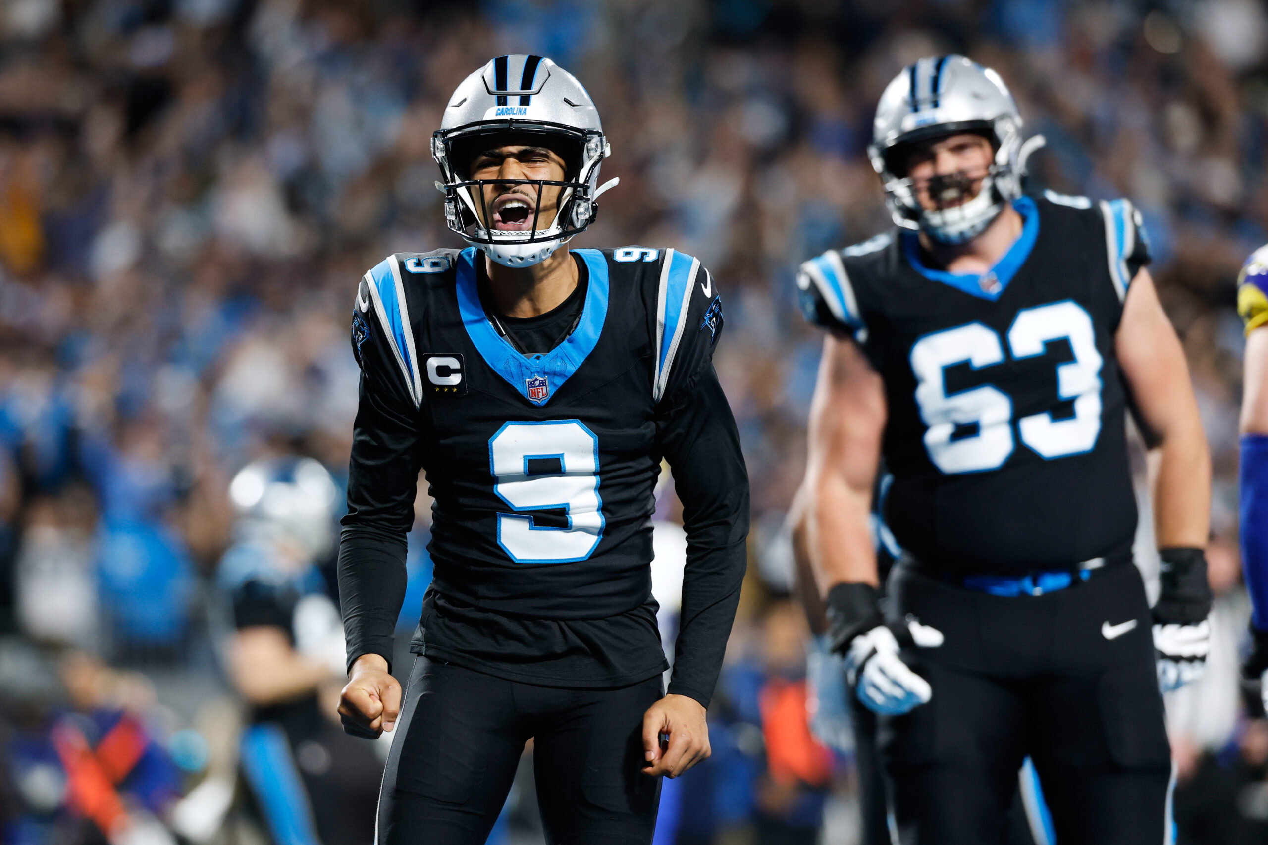 Carolina Panthers quarterback Bryce Young (9) celebrates after scoring a...