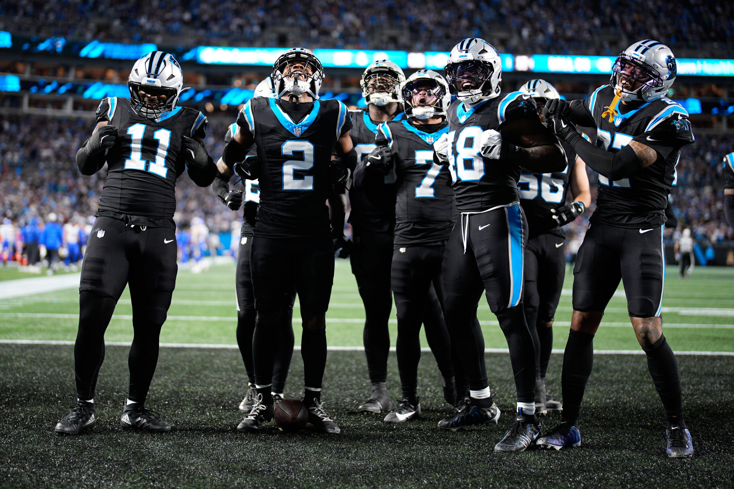Carolina Panthers cornerback Mike Jackson (2) celebrates with teammates after...