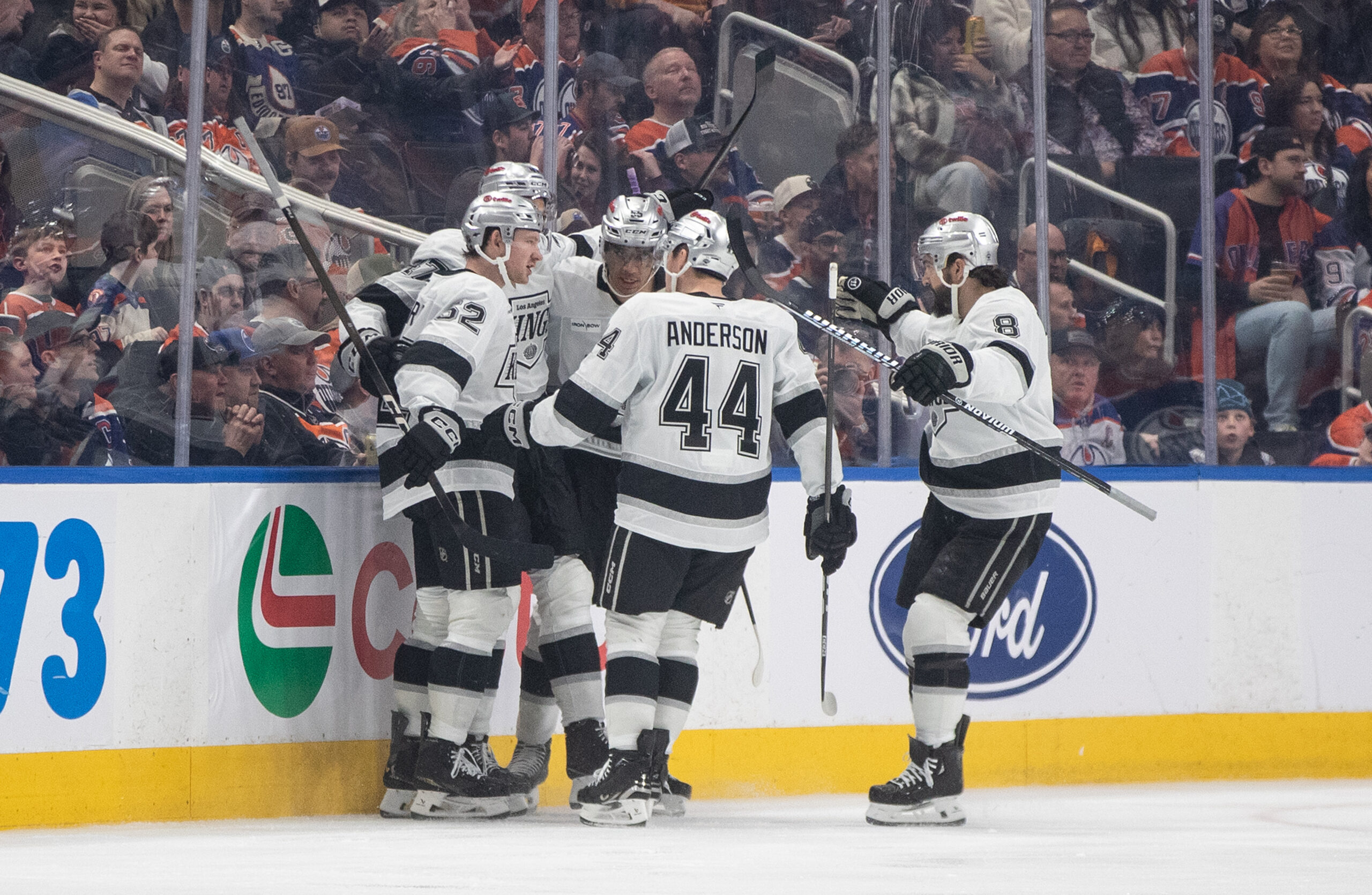 Kings players celebrate a goal against the Edmonton Oilers during...