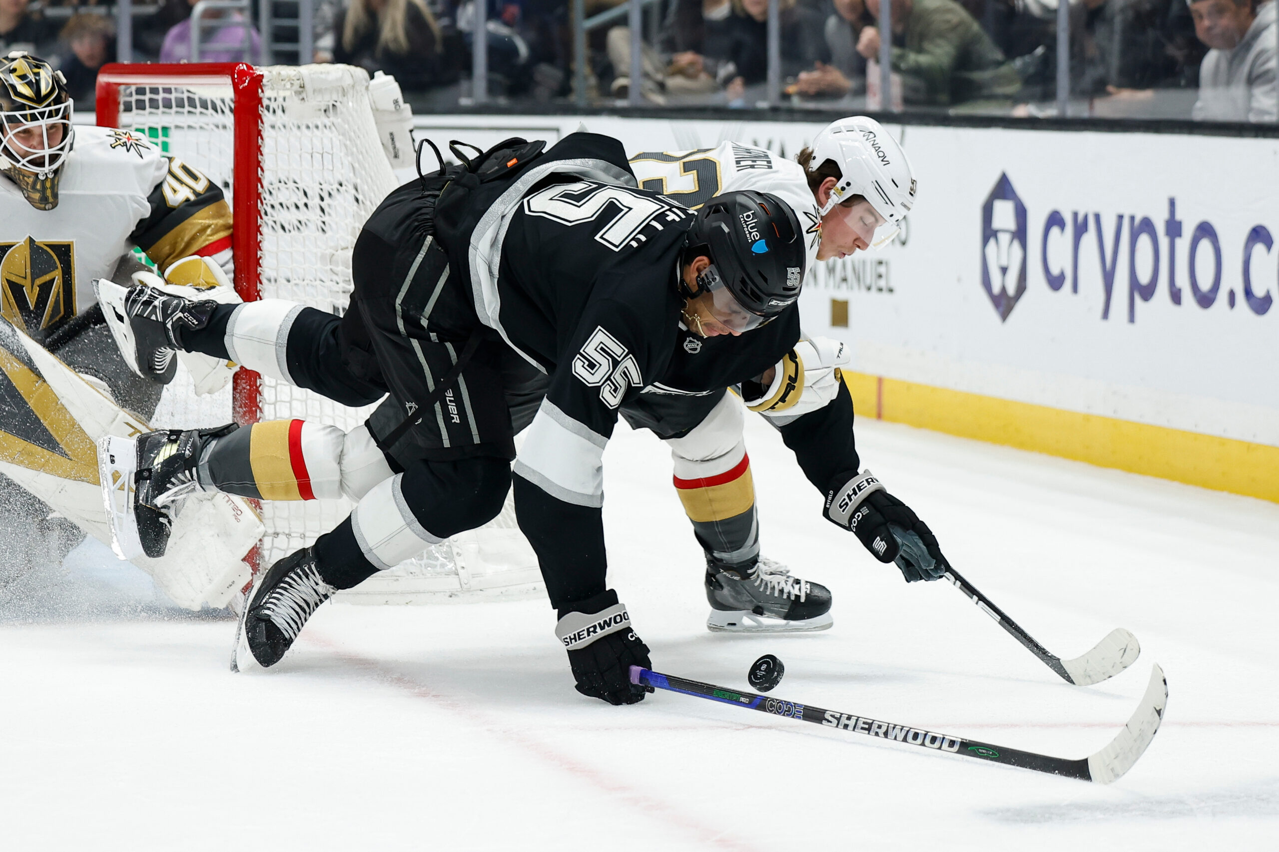 Kings right wing Quinton Byfield, front, and Vegas Golden Knights...