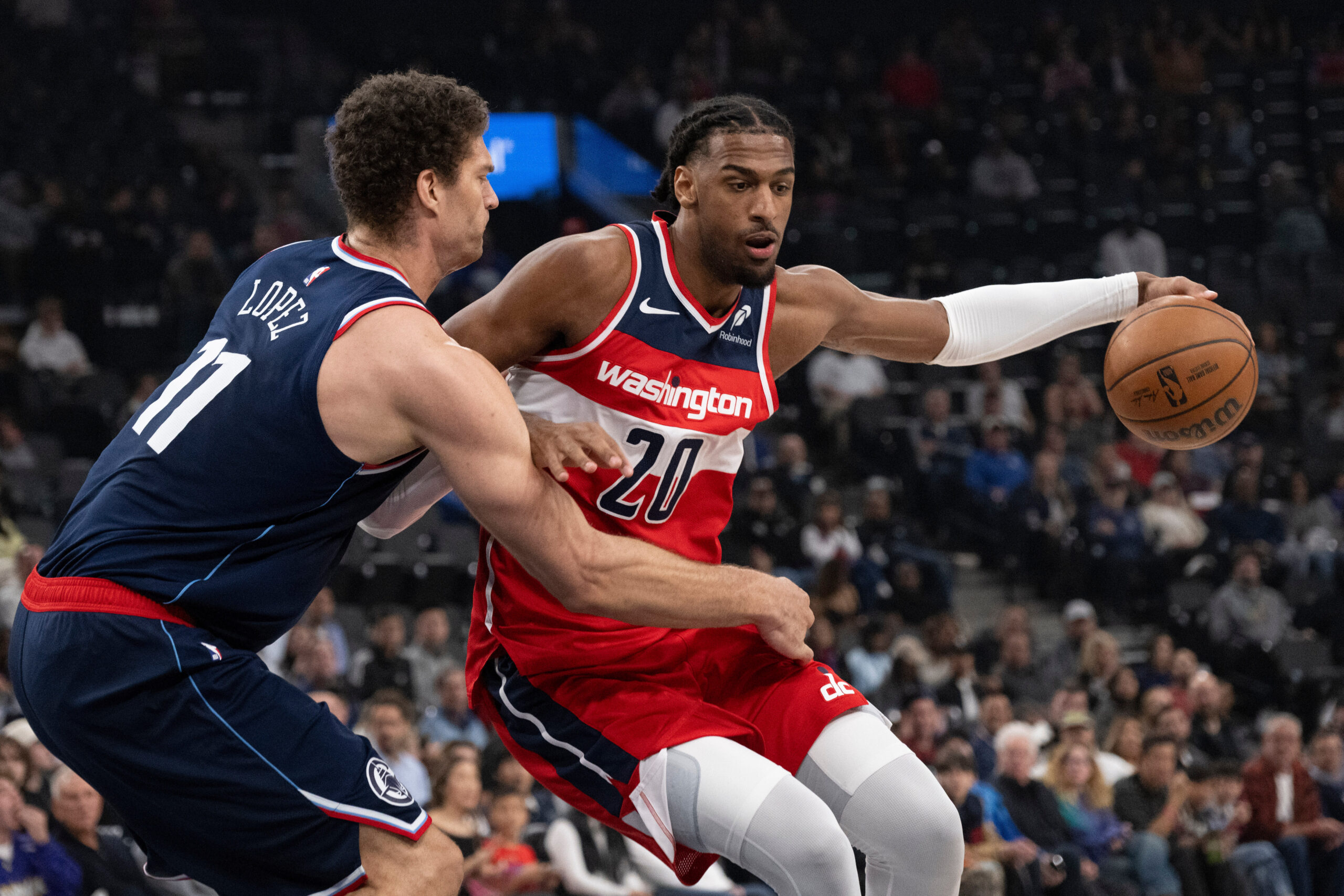 Washington Wizards center Alex Sarr handles the ball as Clippers...