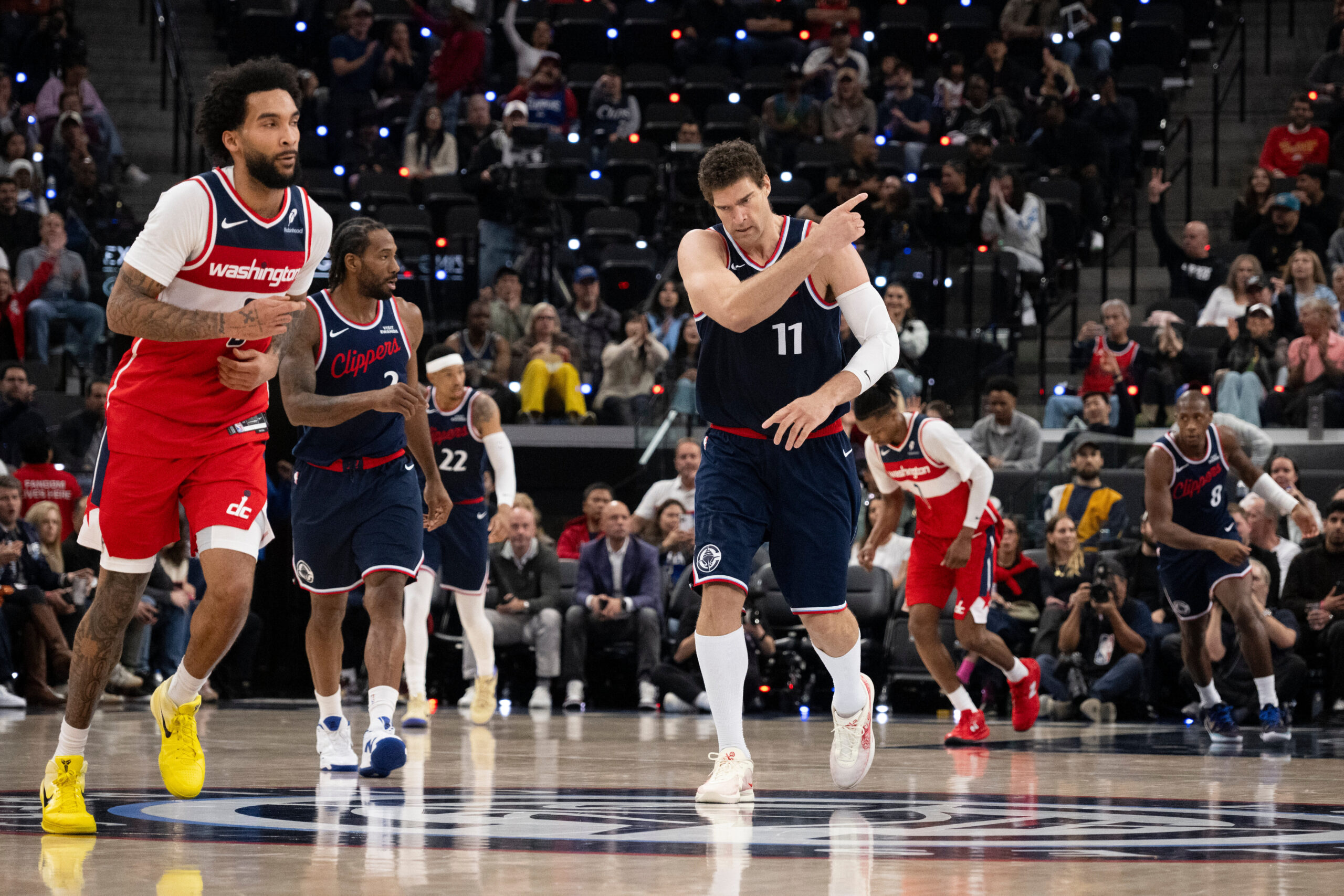 Clippers center Brook Lopez (11) gestures after scoring during the...