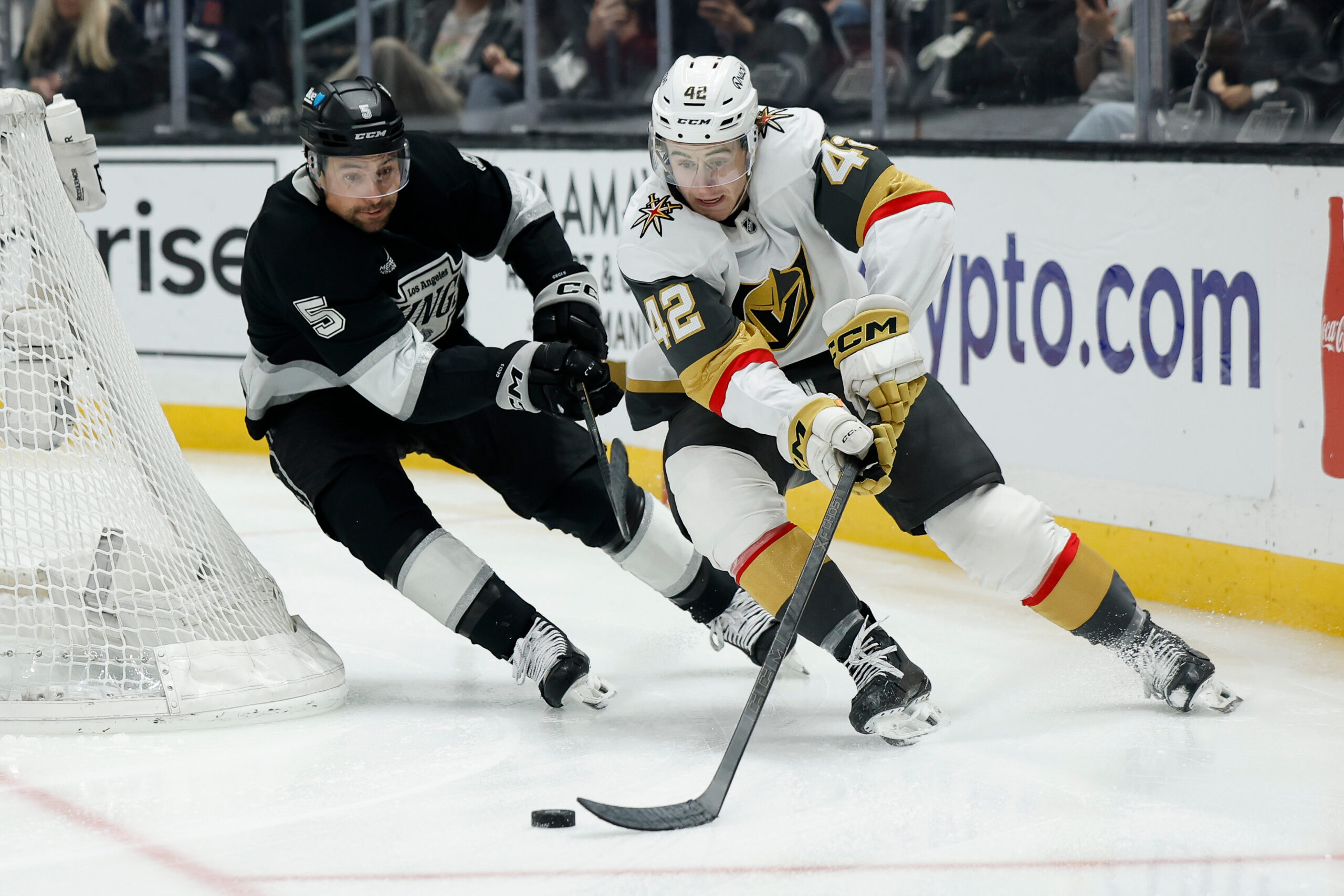 Vegas Golden Knights right wing Braeden Bowman, right, skates with...