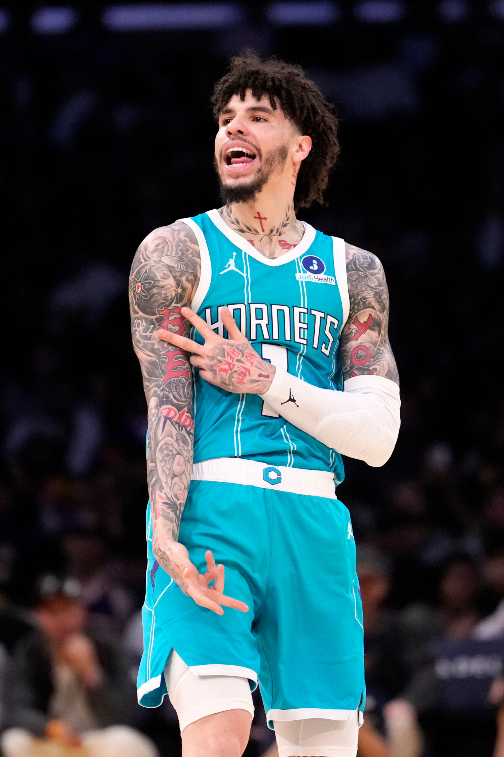 Charlotte Hornets guard LaMelo Ball celebrates after scoring during the...