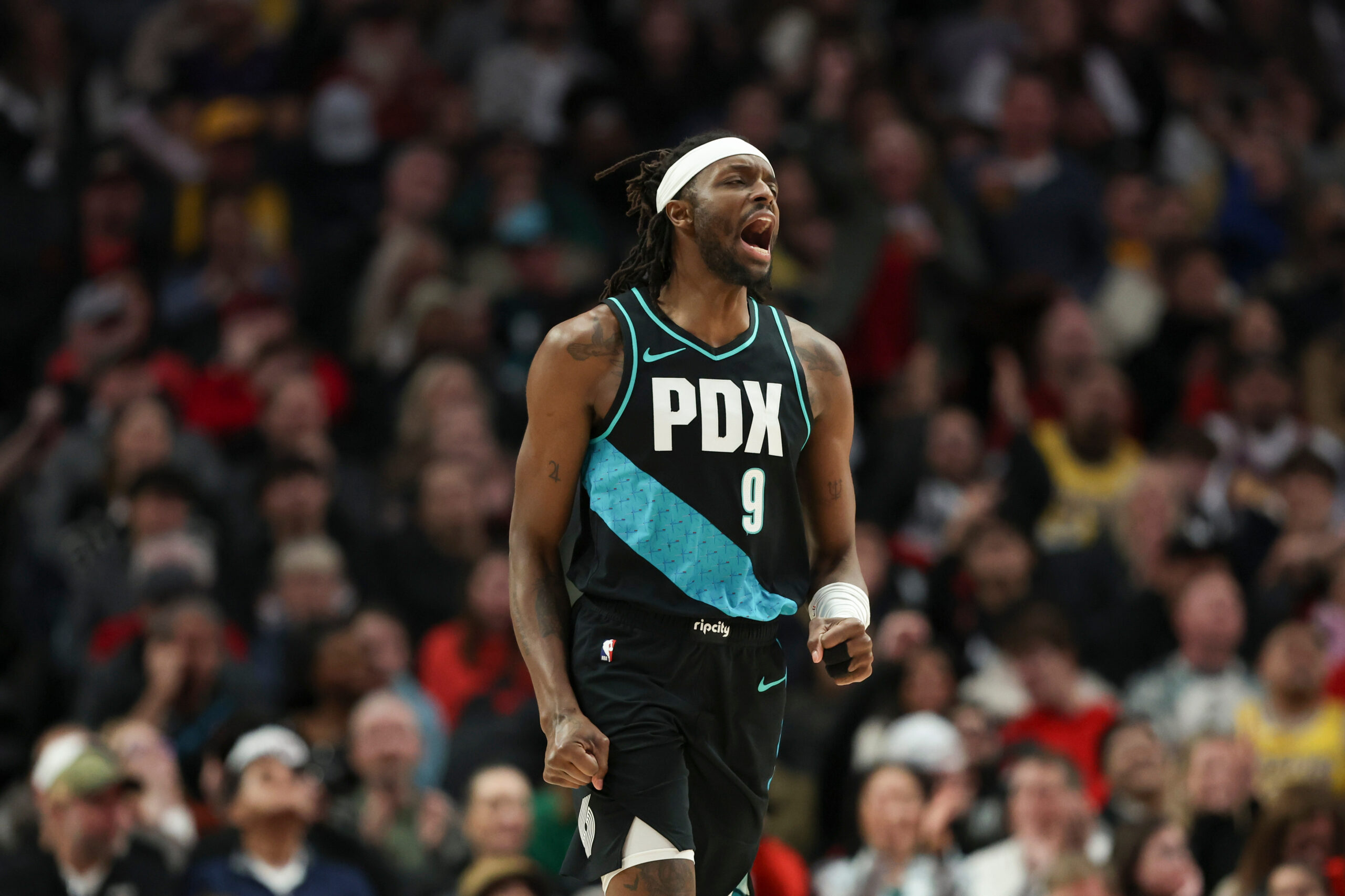 Portland Trail Blazers forward Jerami Grant reacts after a basket...