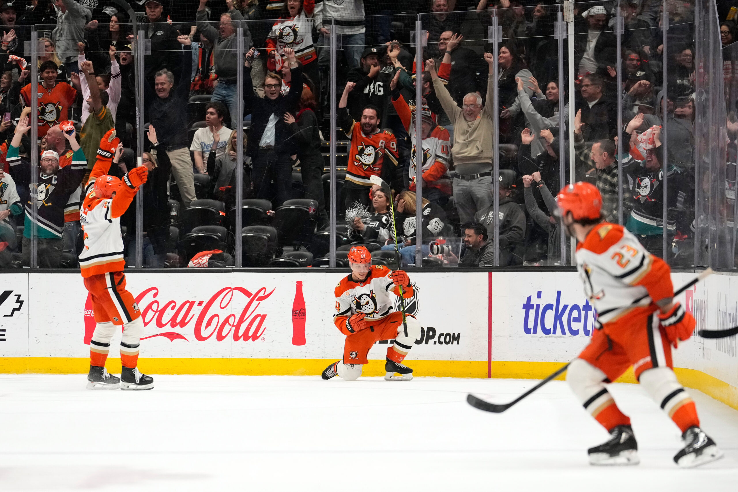 Ducks center Mikael Granlund, center, celebrates his game-winning goal along...