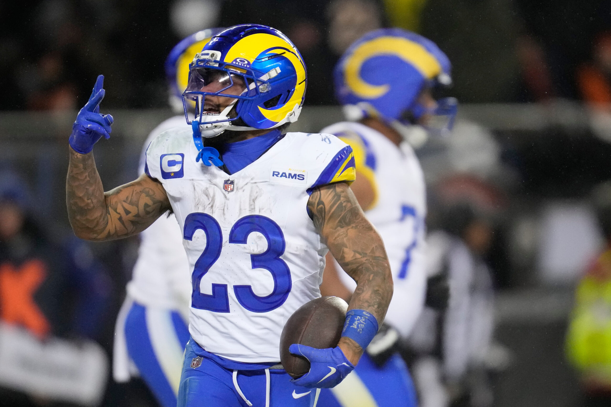 Rams running back Kyren Williams gestures after scoring a touchdown...