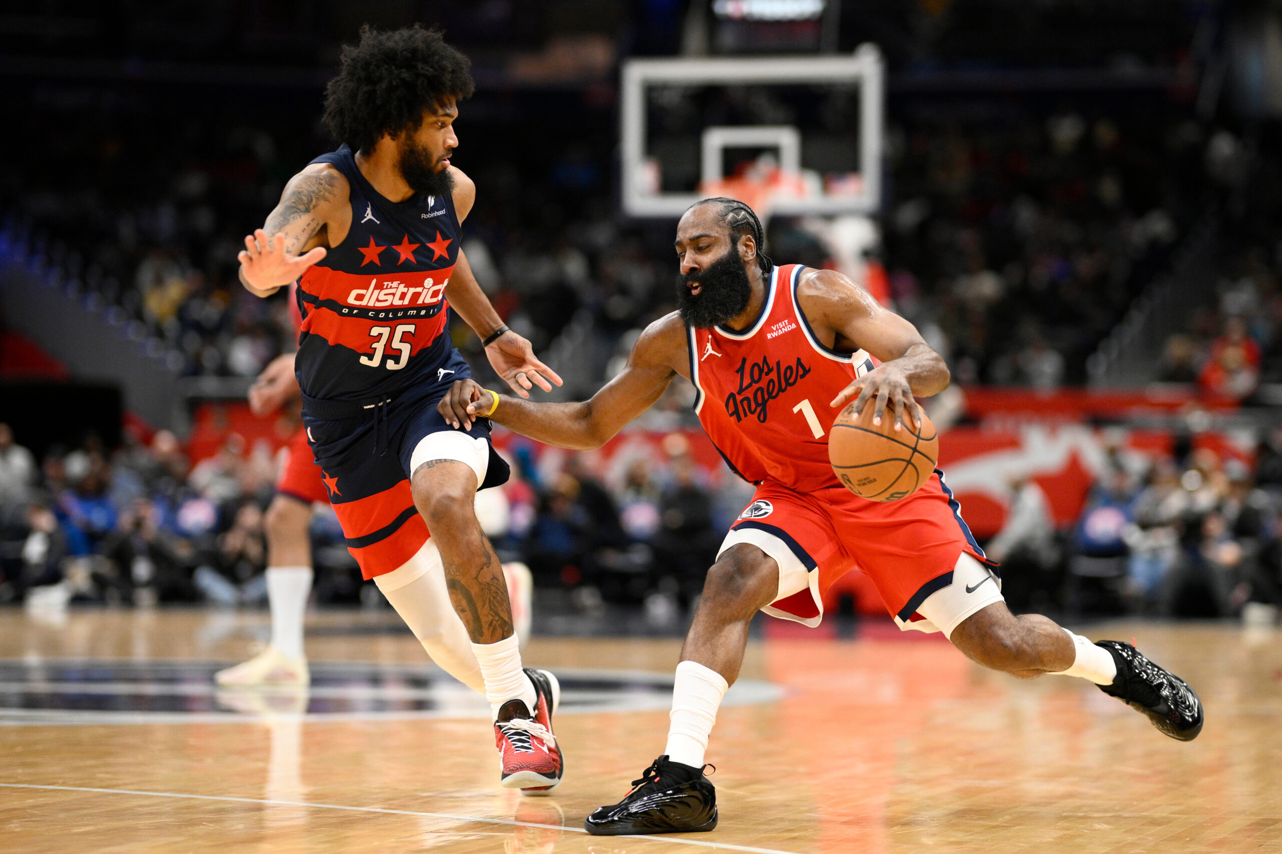 Clippers guard James Harden drives as Washington Wizards forward Marvin...
