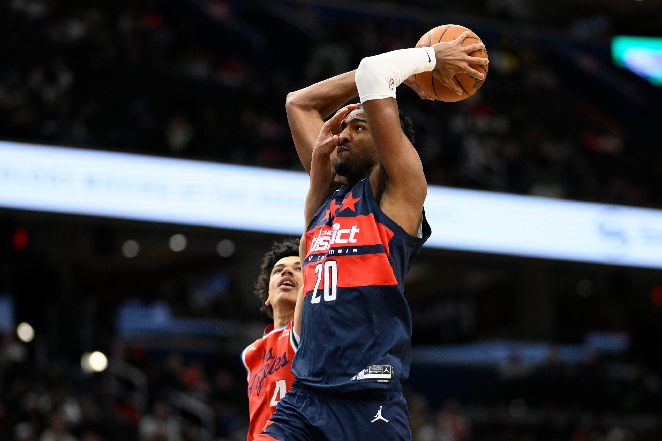 Washington Wizards center Alex Sarr goes to the basket as...