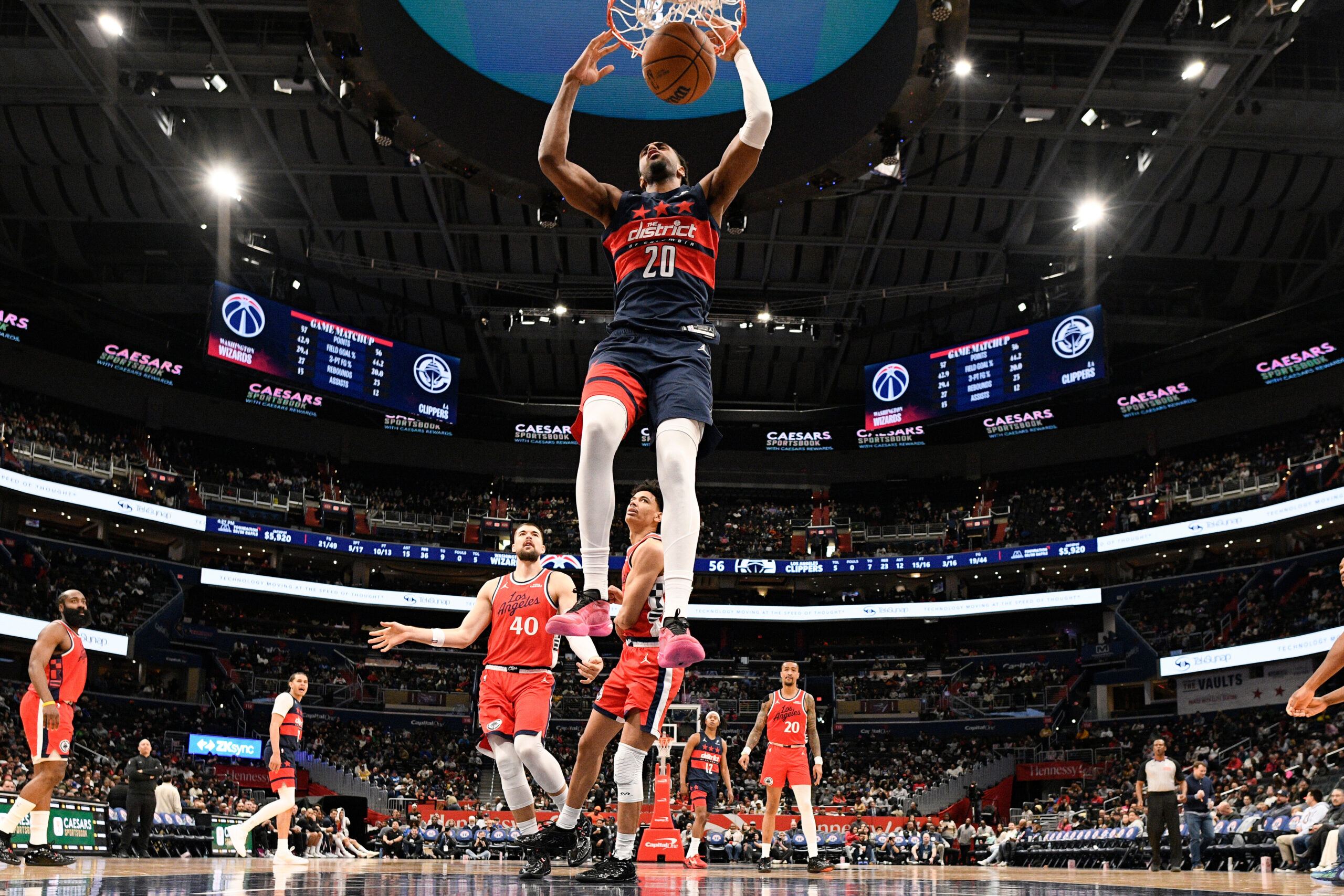 Washington Wizards center Alex Sarr dunks during the second half...