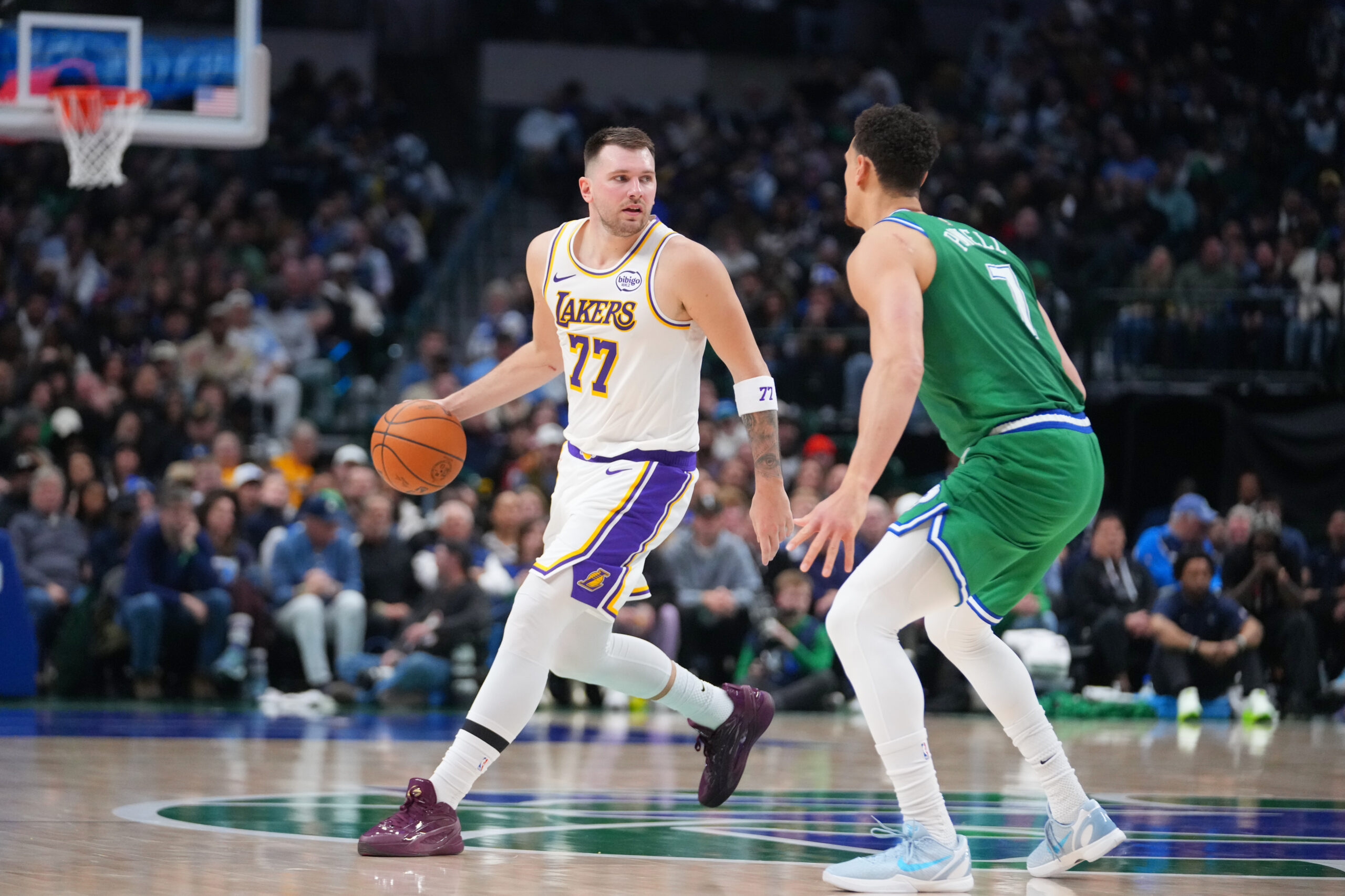 Lakers guard Luka Doncic (77) works the floor against Dallas...