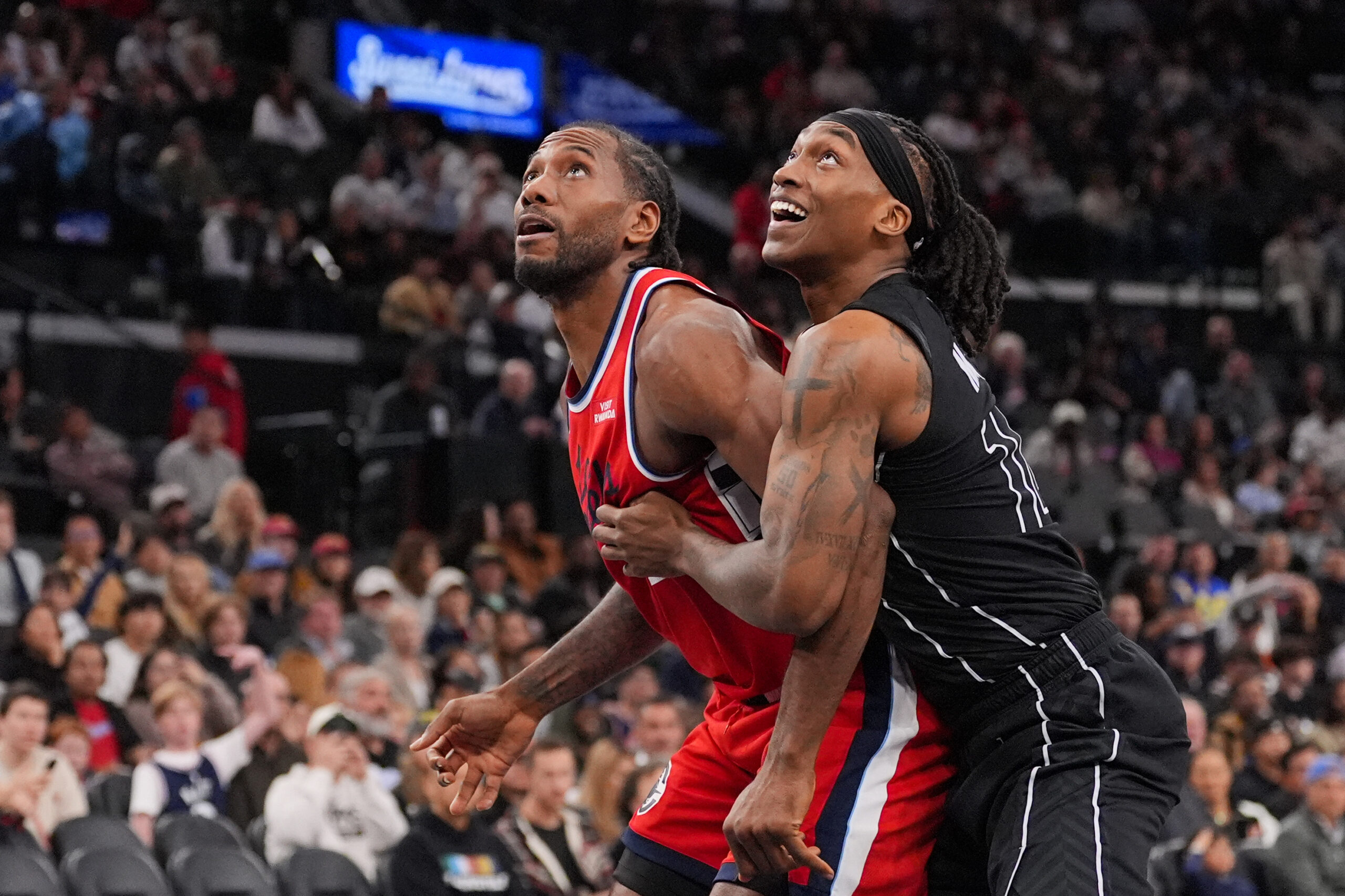 Clippers forward Kawhi Leonard, left, and Brooklyn Nets guard/forward Terance...