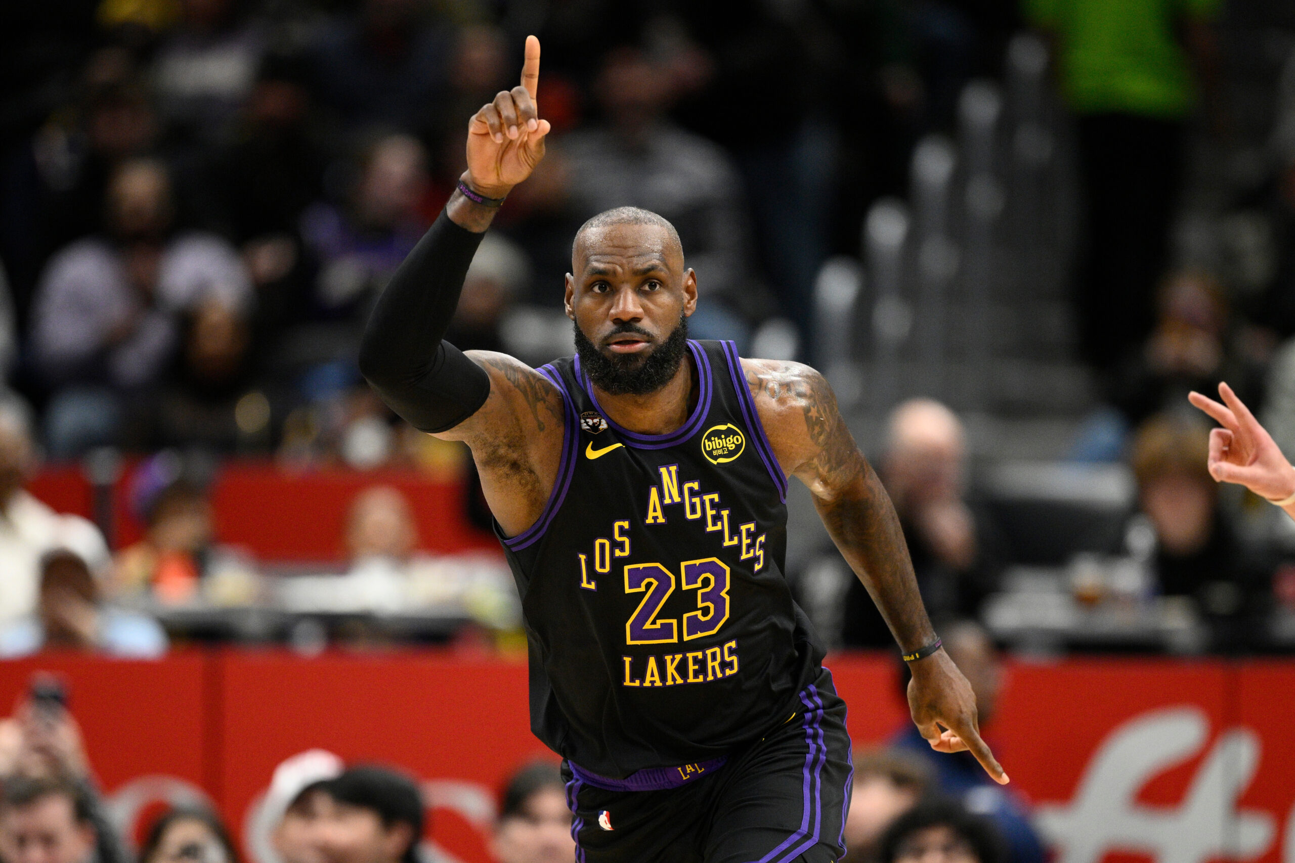 Lakers star LeBron James gestures after he scored during the...
