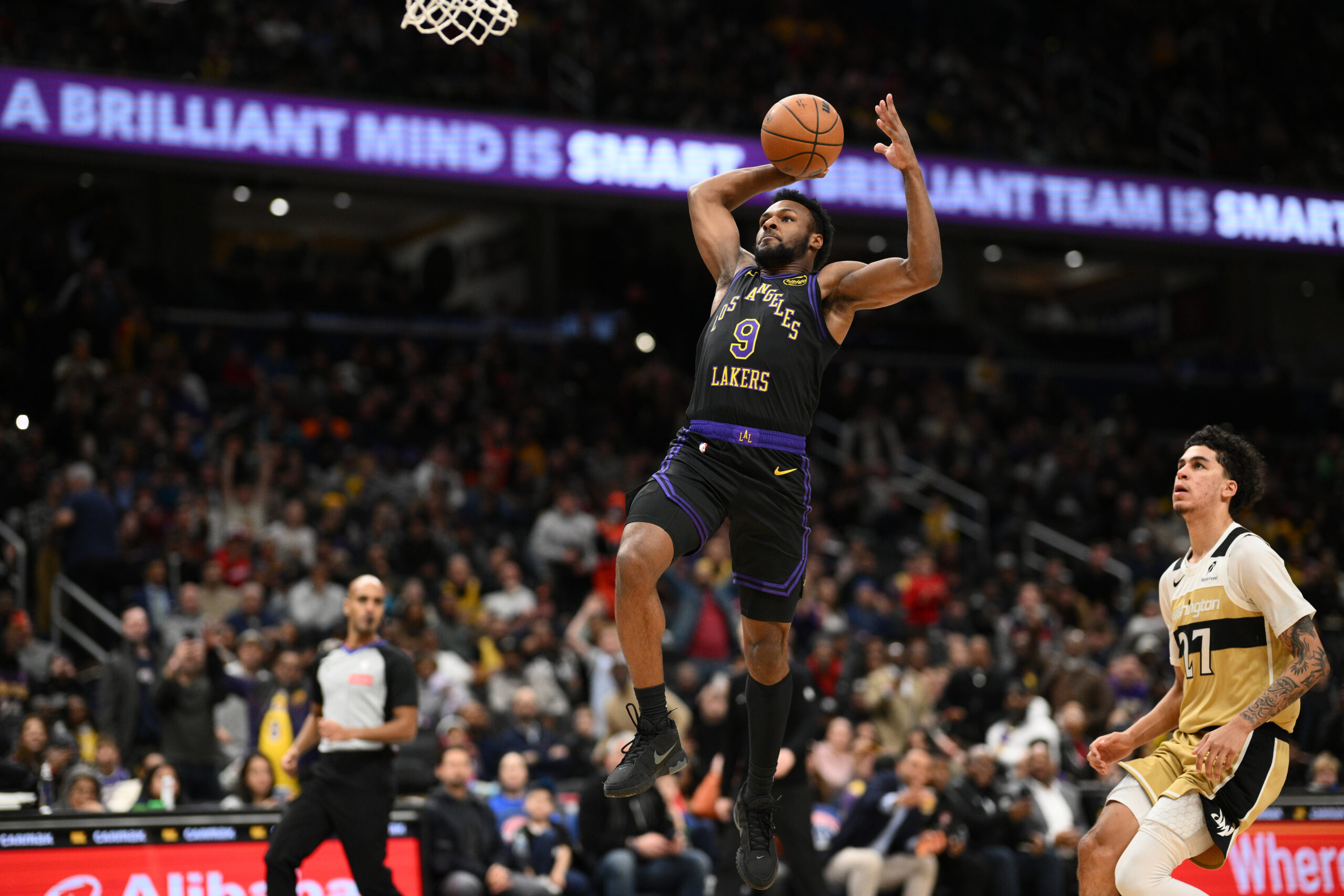 Lakers guard Bronny James Jr. (9) goes to the basket...