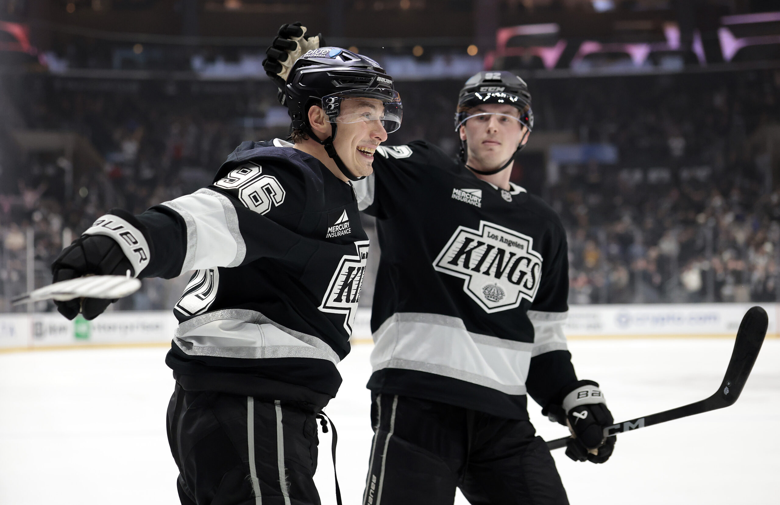 Andrei Kuzmenko, left, celebrates a goal with Brandt Clarke during...