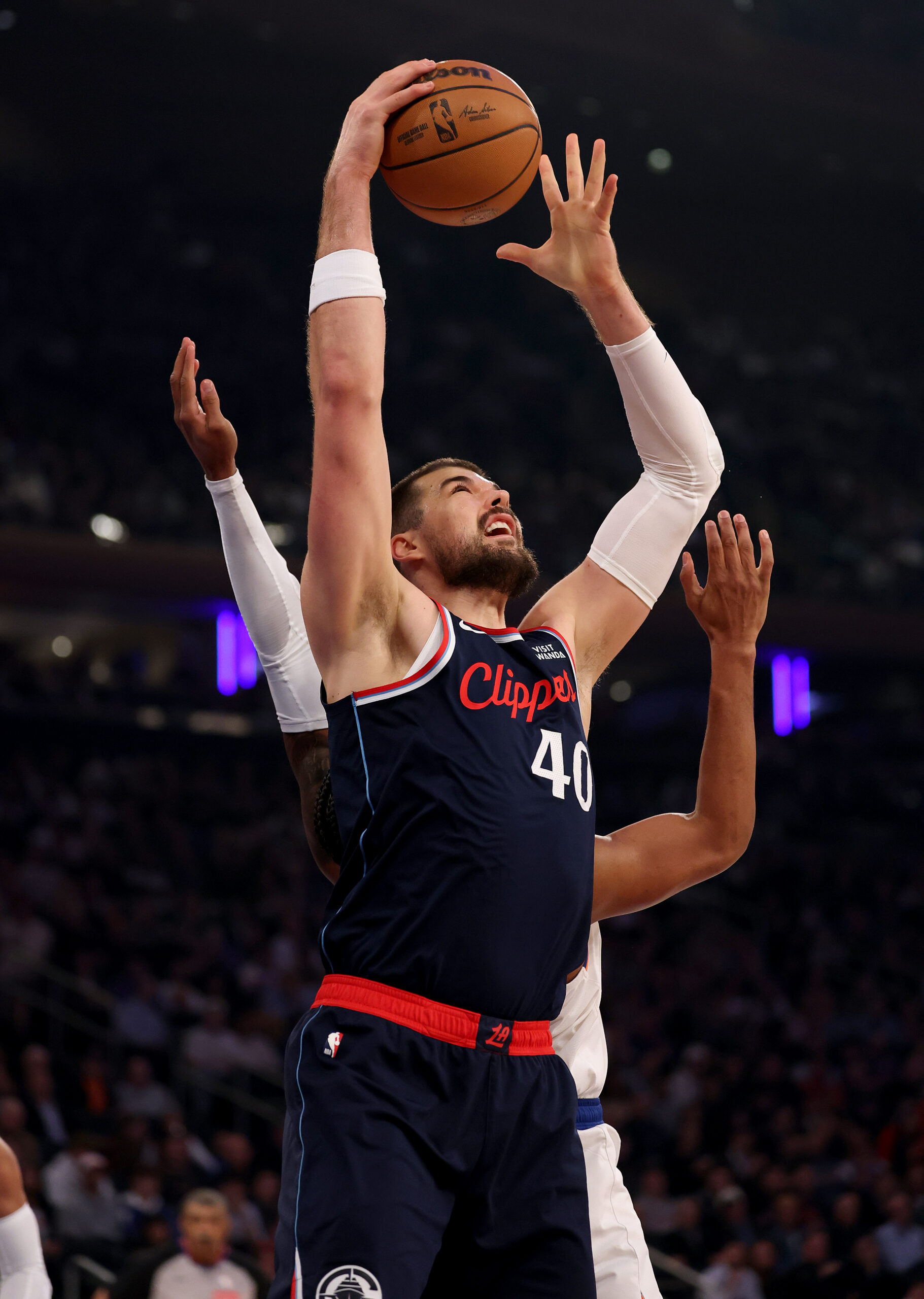 Clippers center Ivica Zubac catches a pass as New York...