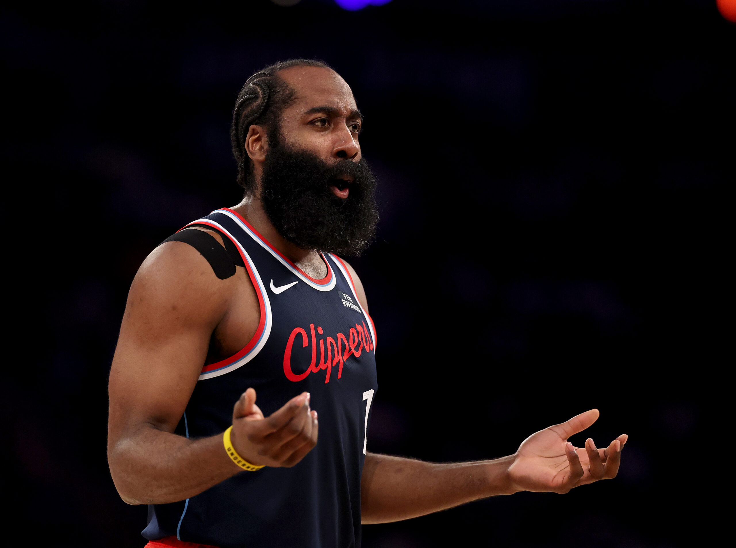 Clippers guard James Harden reacts to an official’s call during...