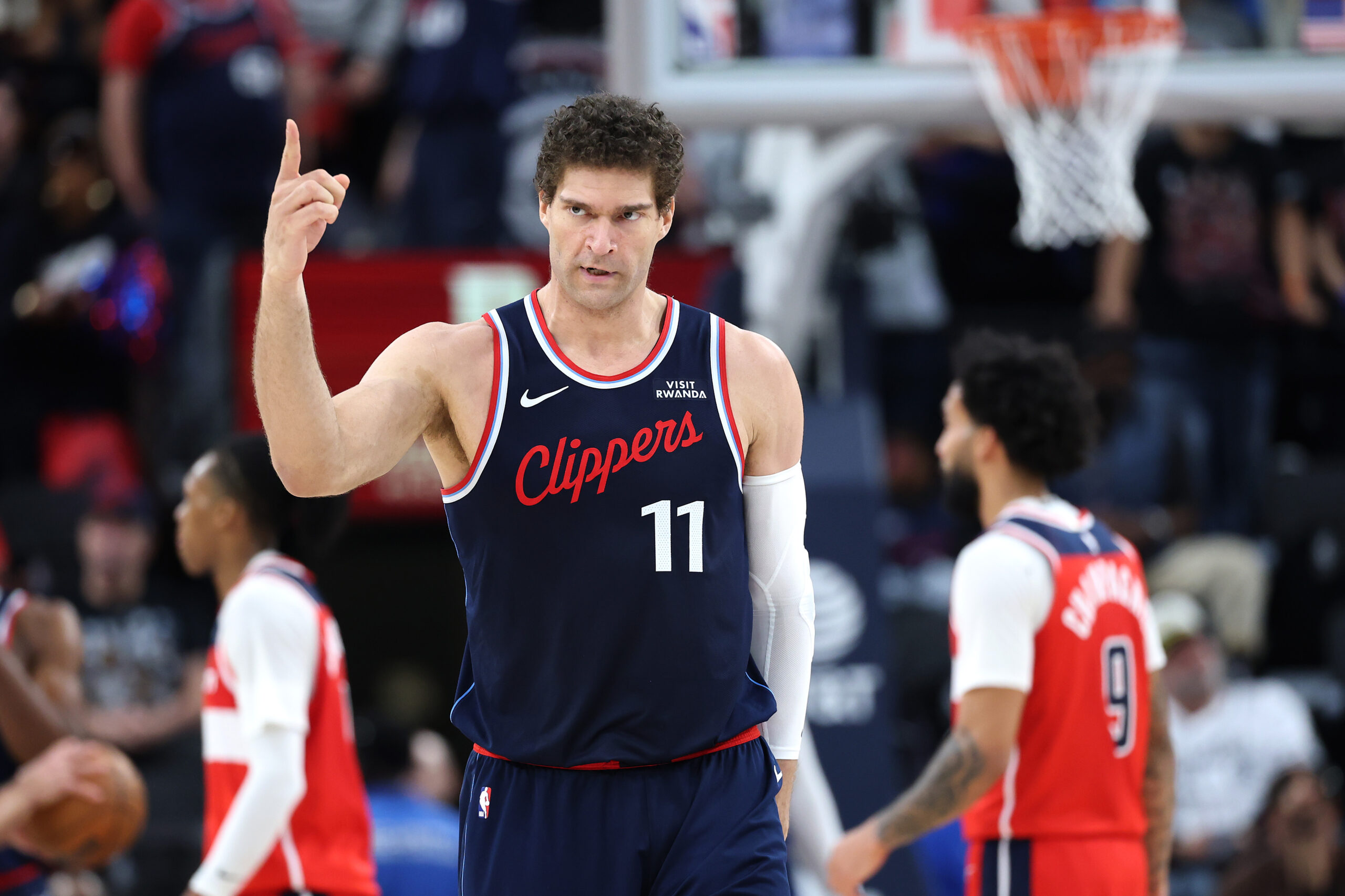Clippers center Brook Lopez reacts to a blocked shot during...
