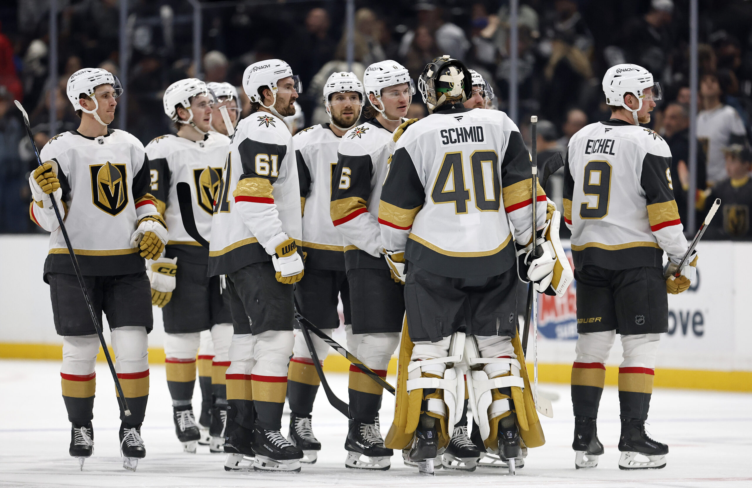 The Vegas Golden Knights celebrate after their 3-2 overtime victory...