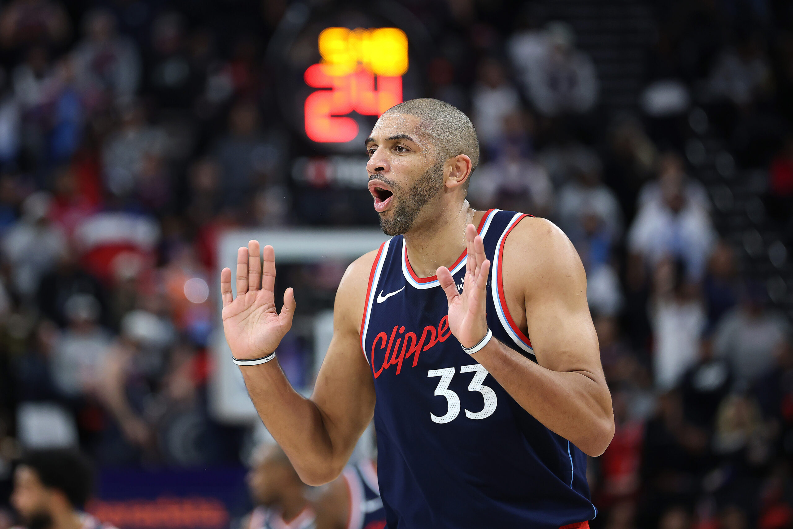 Clippers forward Nicolas Batum reacts to a foul call during...