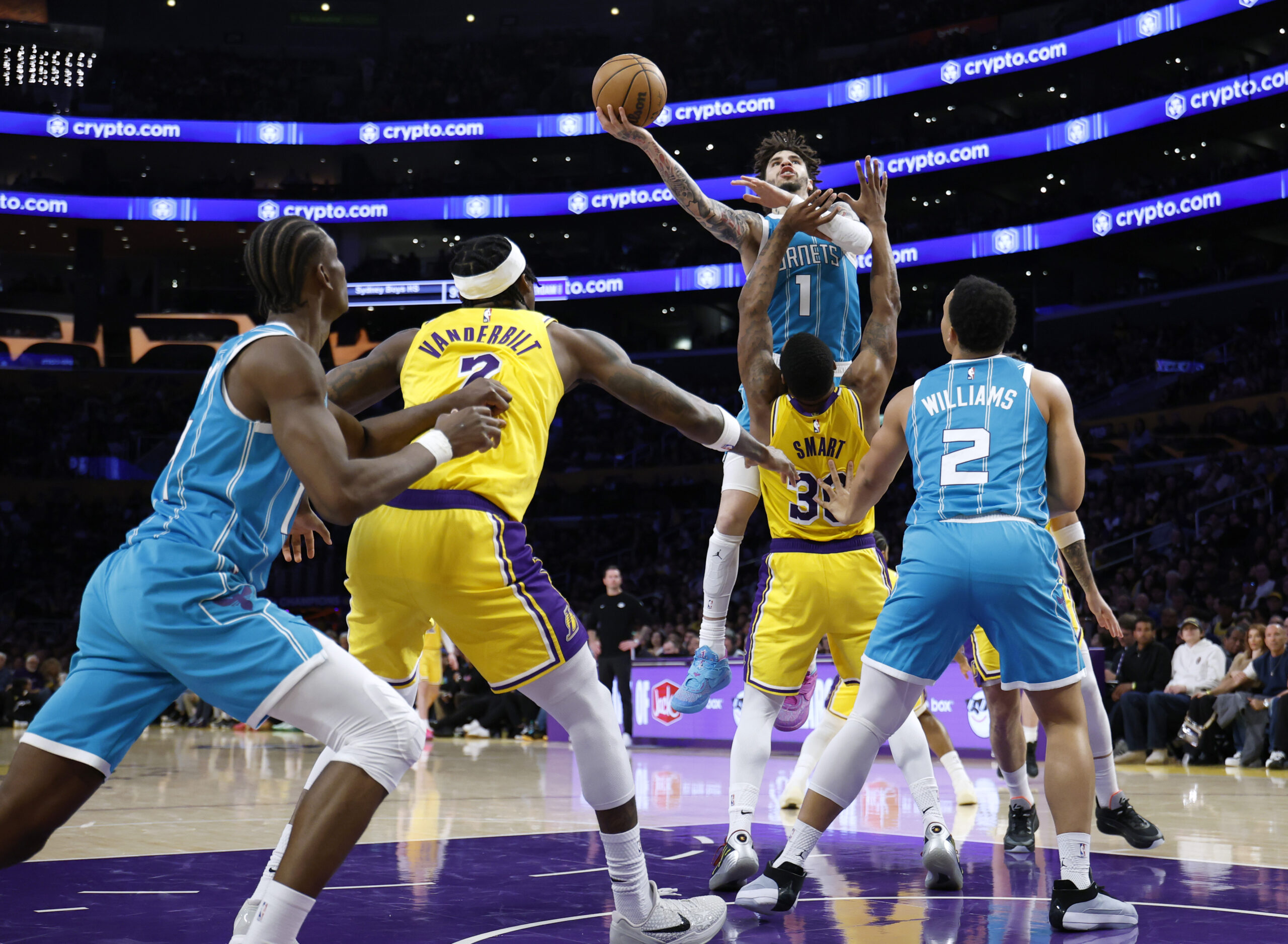 Charlotte Hornets guard LaMelo Ball (1) attempts a shot as...