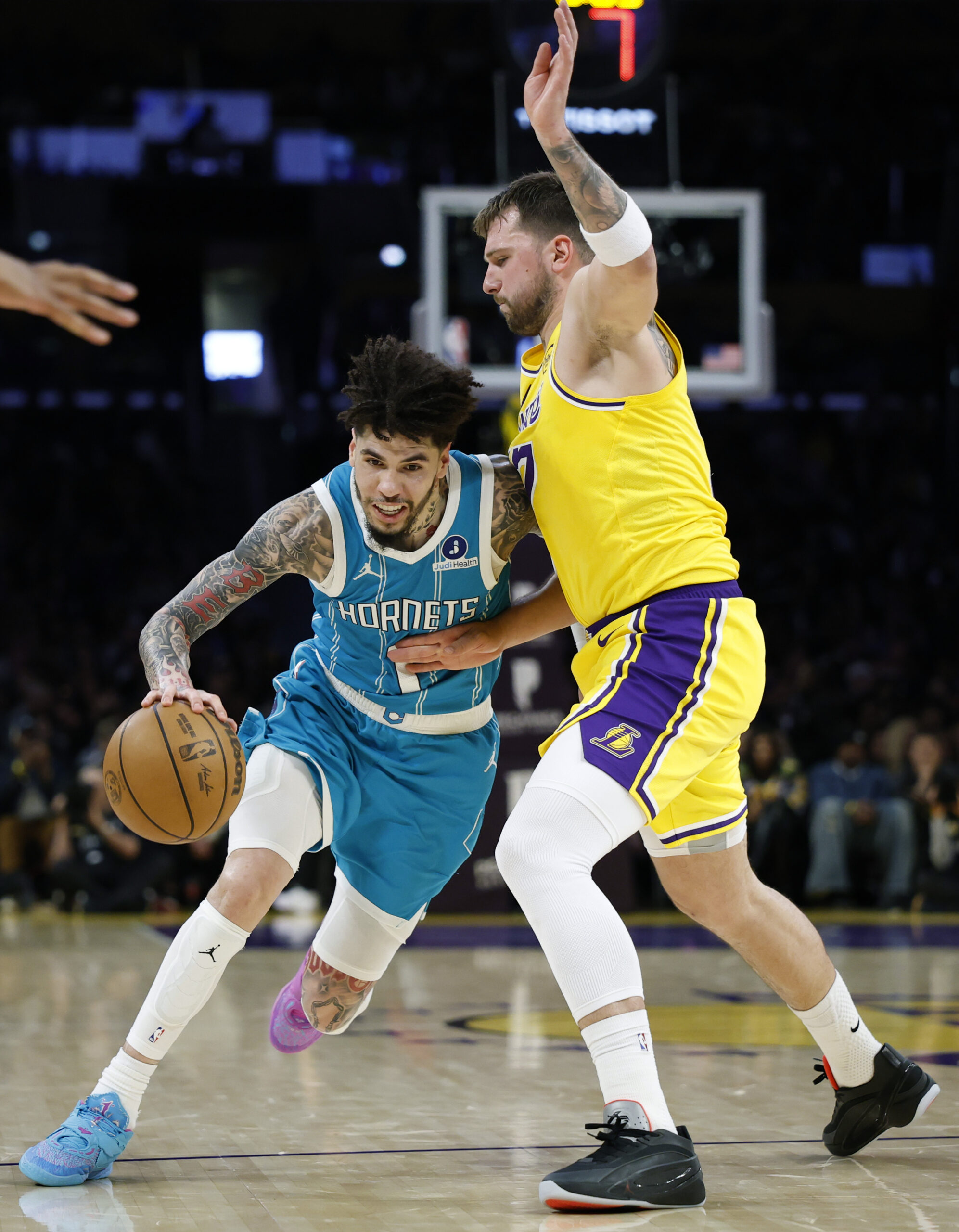 Charlotte Hornets guard LaMelo Ball drives to the basket as...