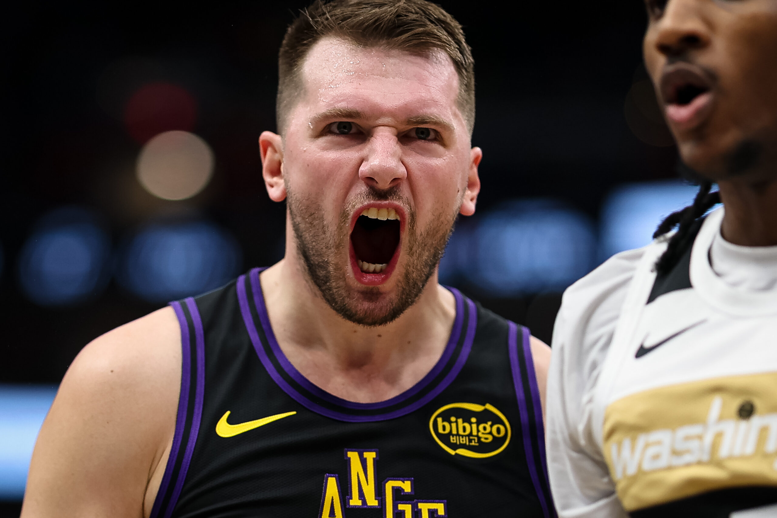 Lakers star Luka Doncic celebrates during the first half of...
