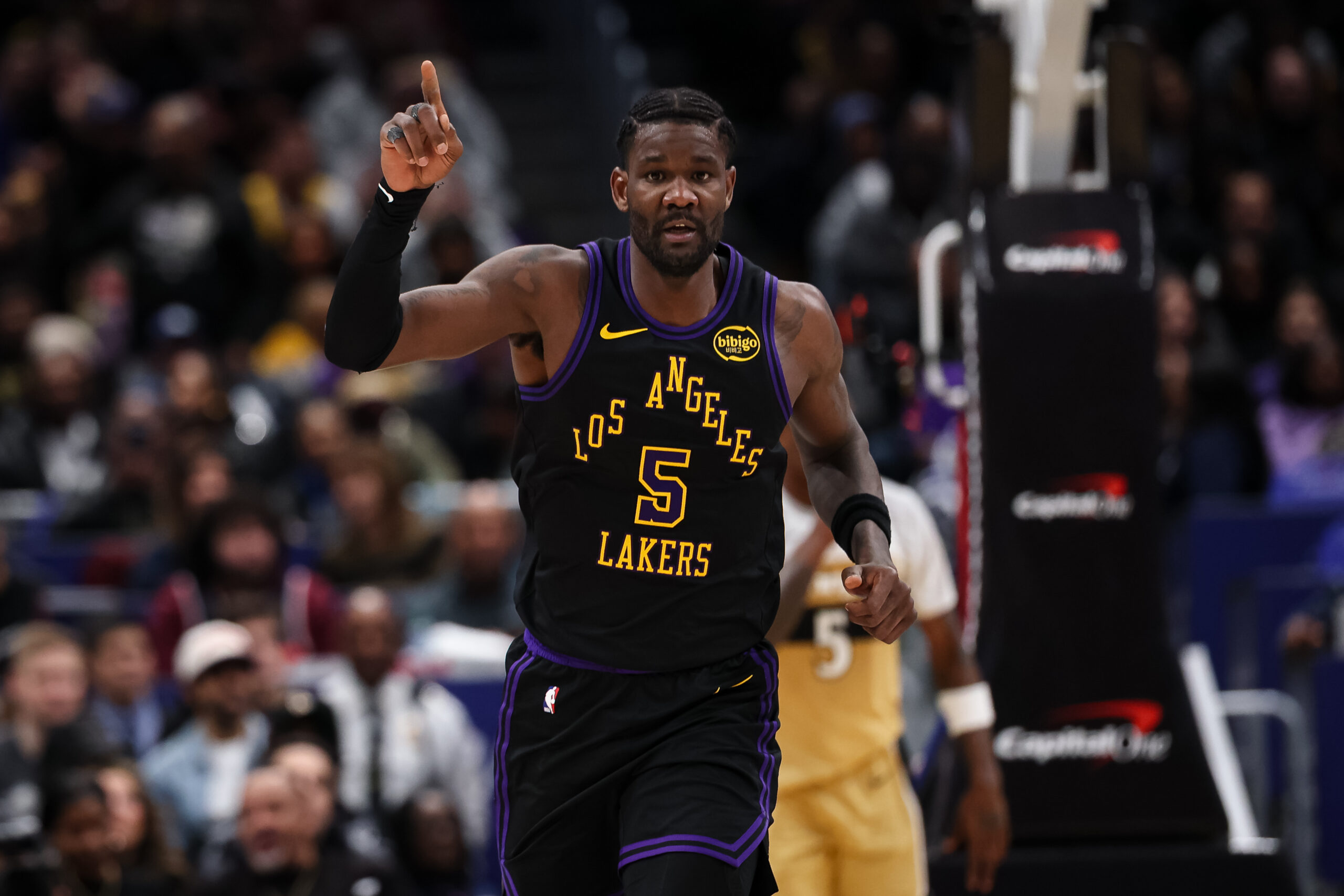 Lakers center Deandre Ayton celebrates after scoring during the second...