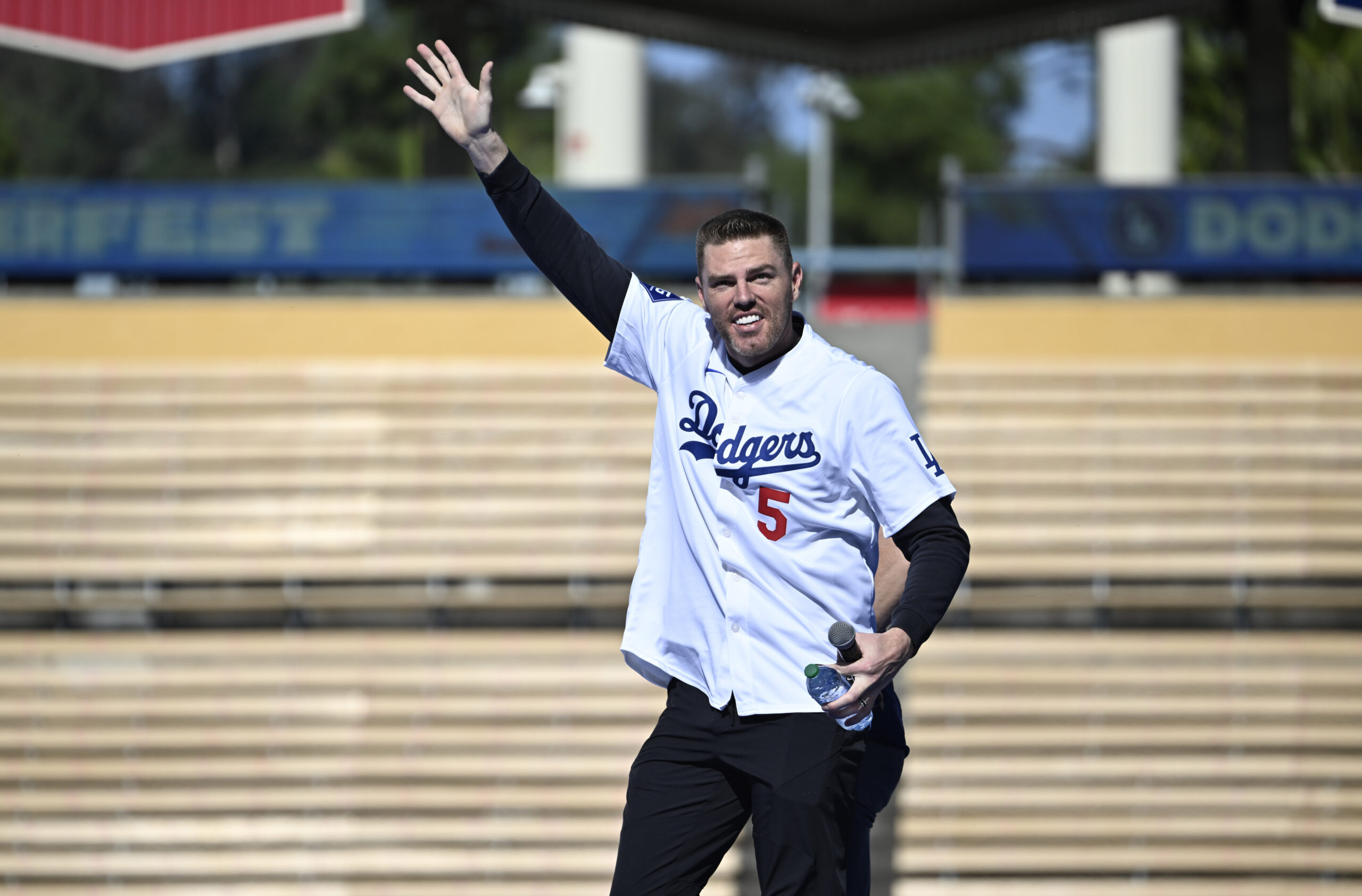 Freddie Freeman #5 of the Los Angeles Dodgers waves to...