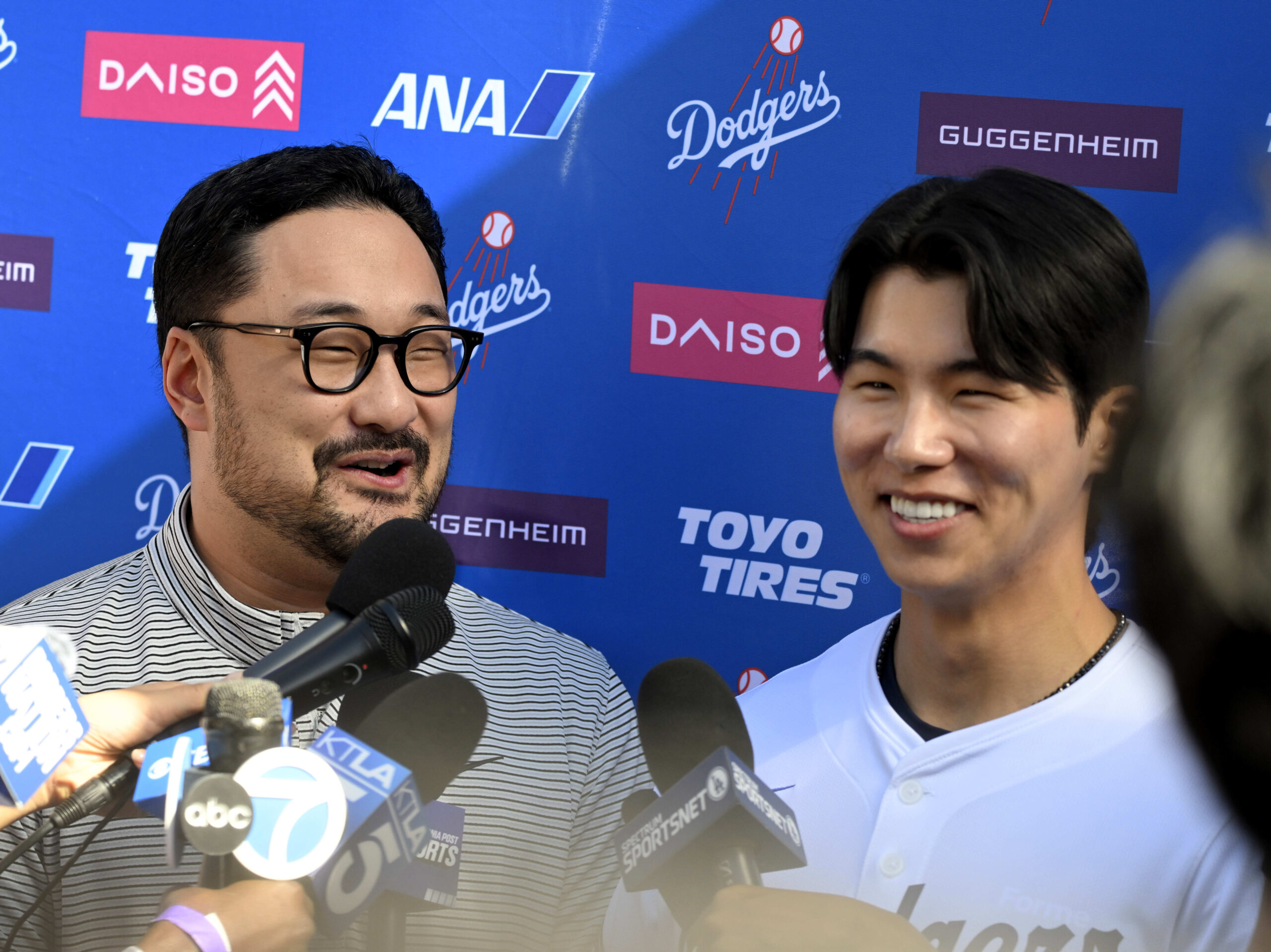 Hyeseong Kim, right, of the Los Angeles Dodgers with the...