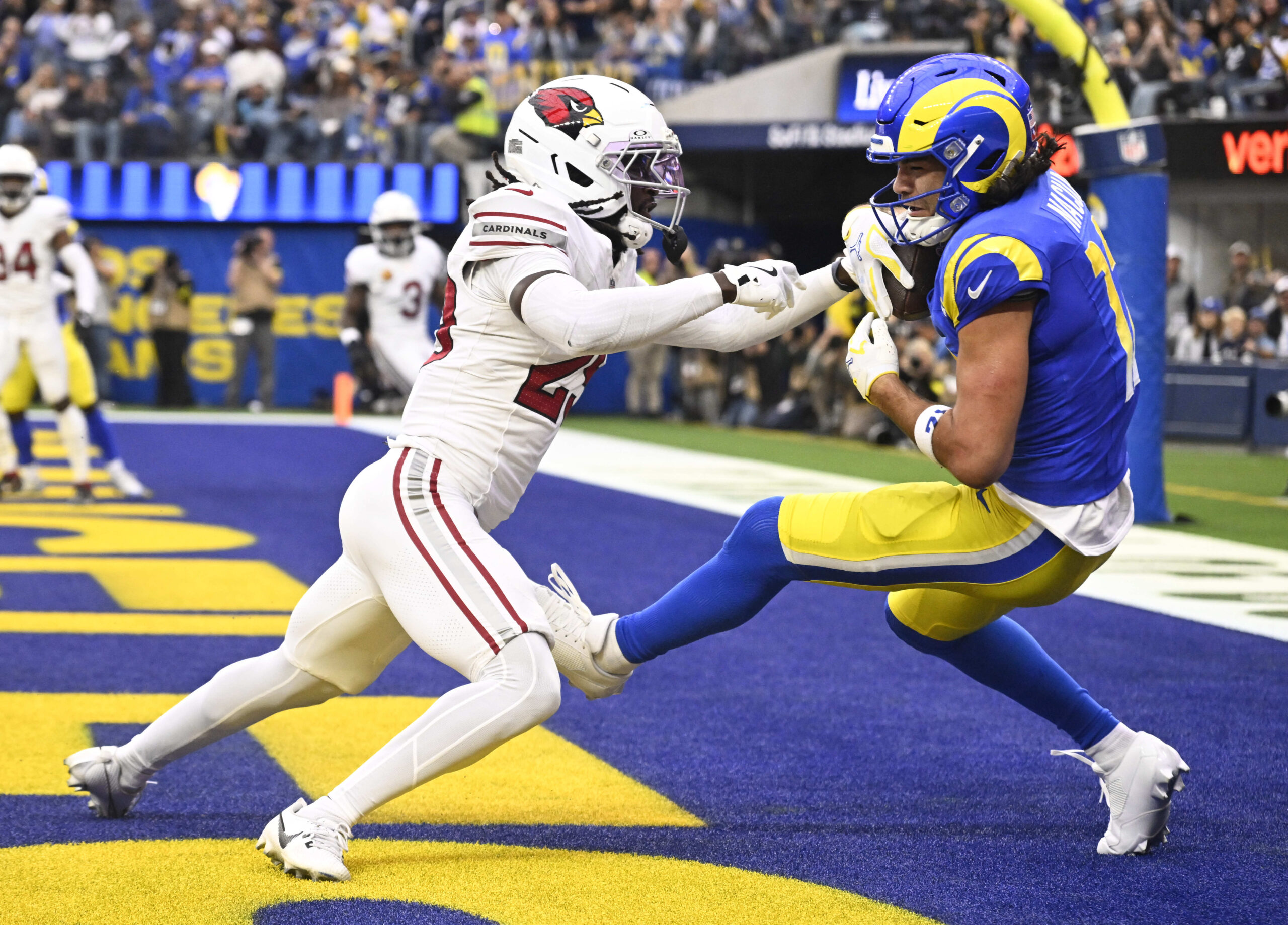 Rams wide receiver Puka Nacua #12 catches a pass in...
