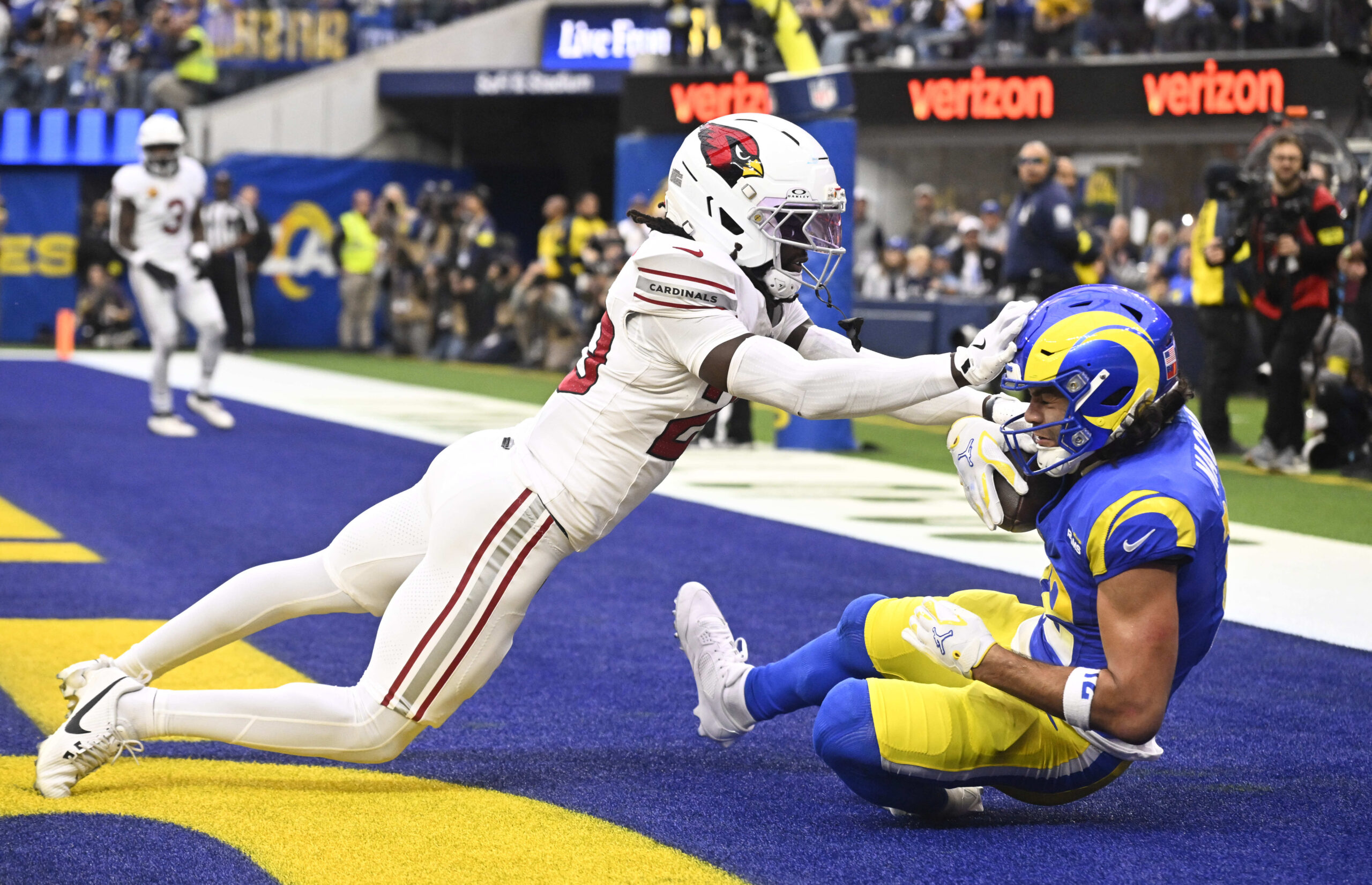 Los Angeles Rams wide receiver Puka Nacua #12 catches a...