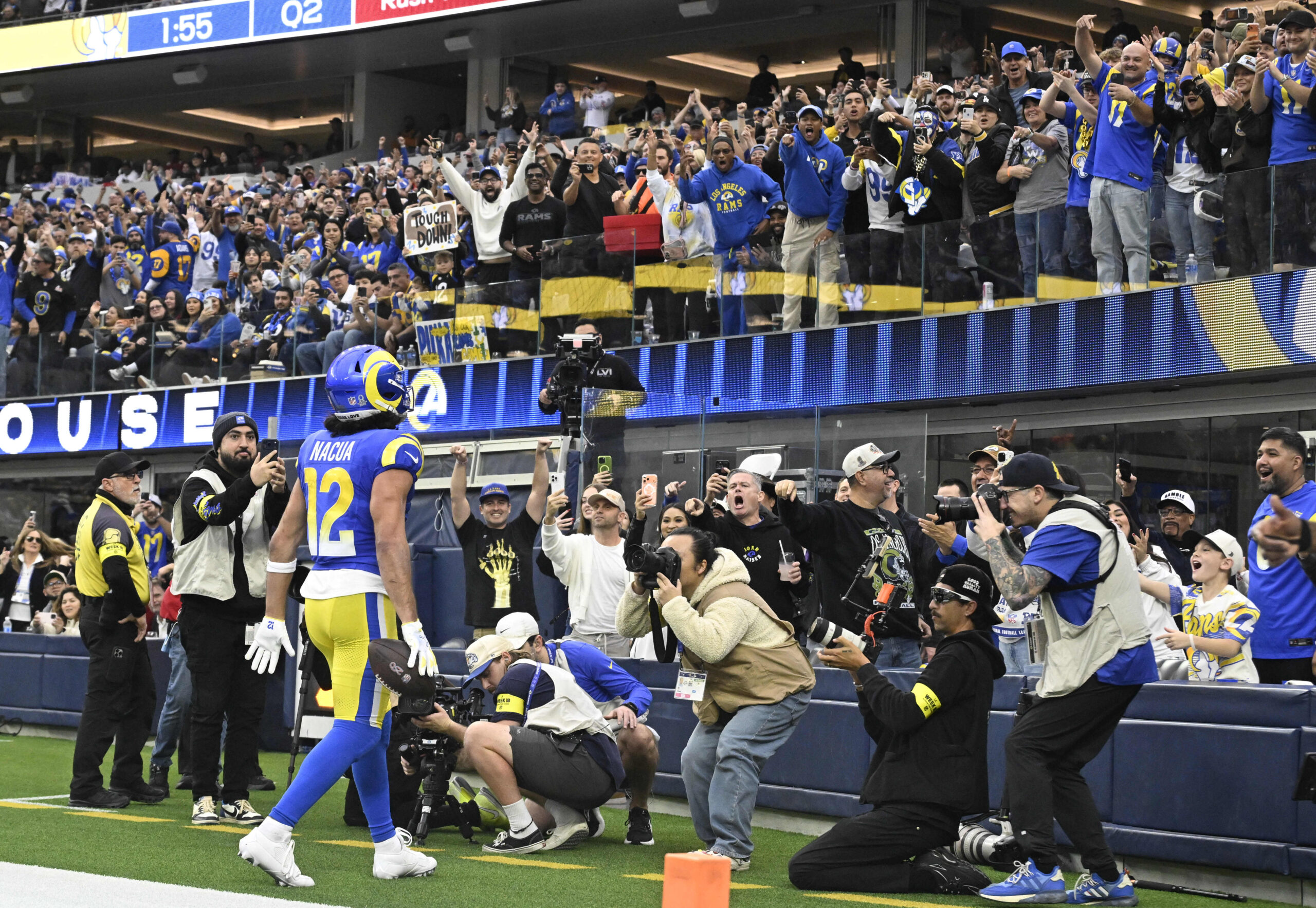 Rams wide receiver Puka Nacua #12 reacts after a touchdown...
