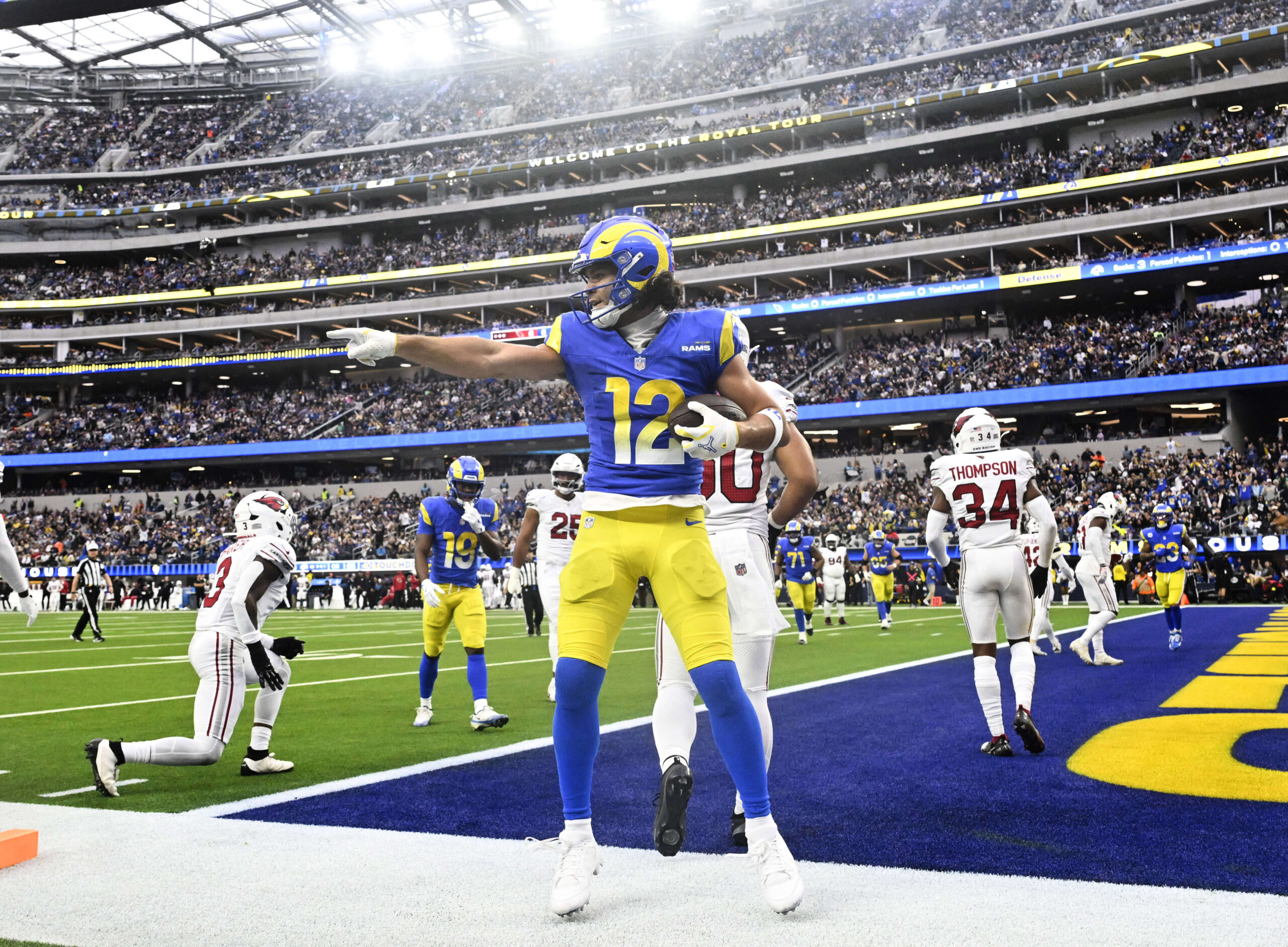 Rams wide receiver Puka Nacua #12 catches a pass for...