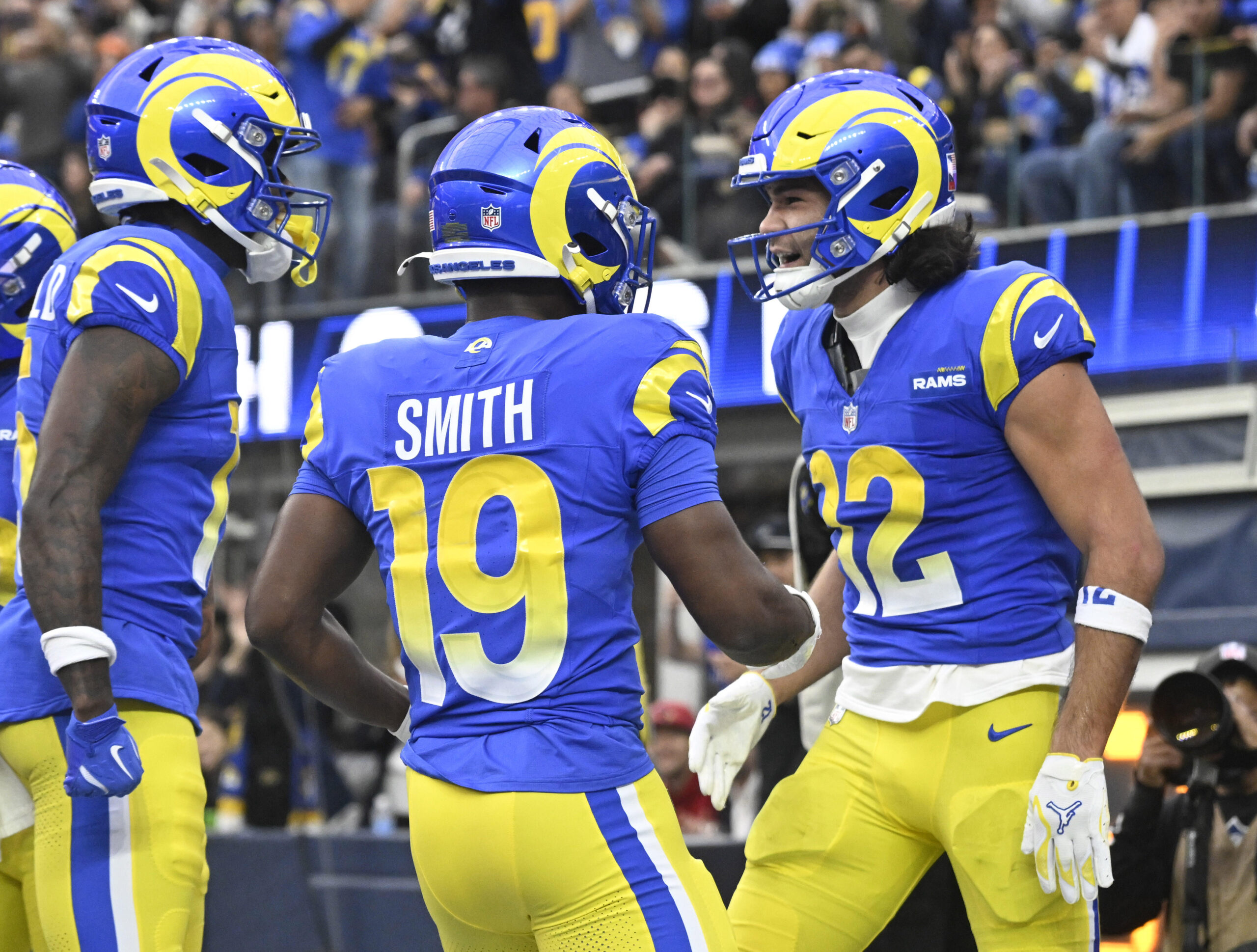 Rams wide receiver Puka Nacua #12 reacts with teammates after...