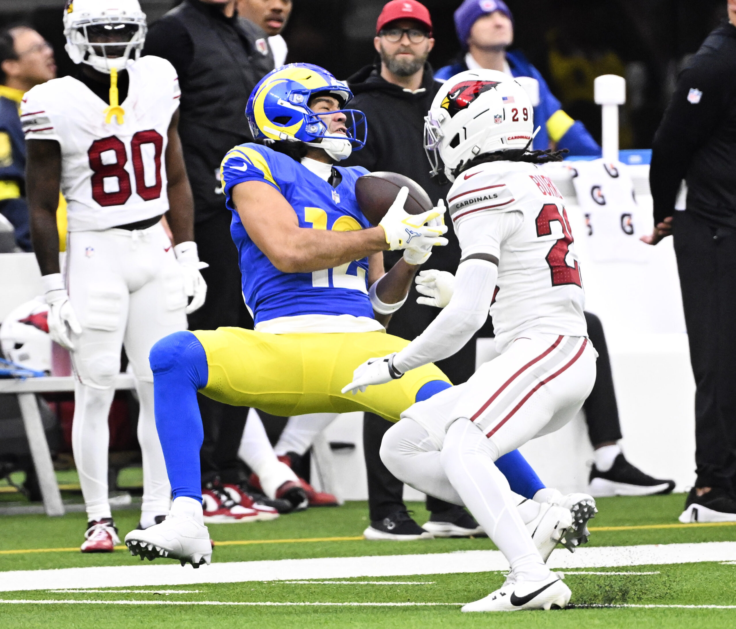 Rams wide receiver Puka Nacua #12 catches a pass for...