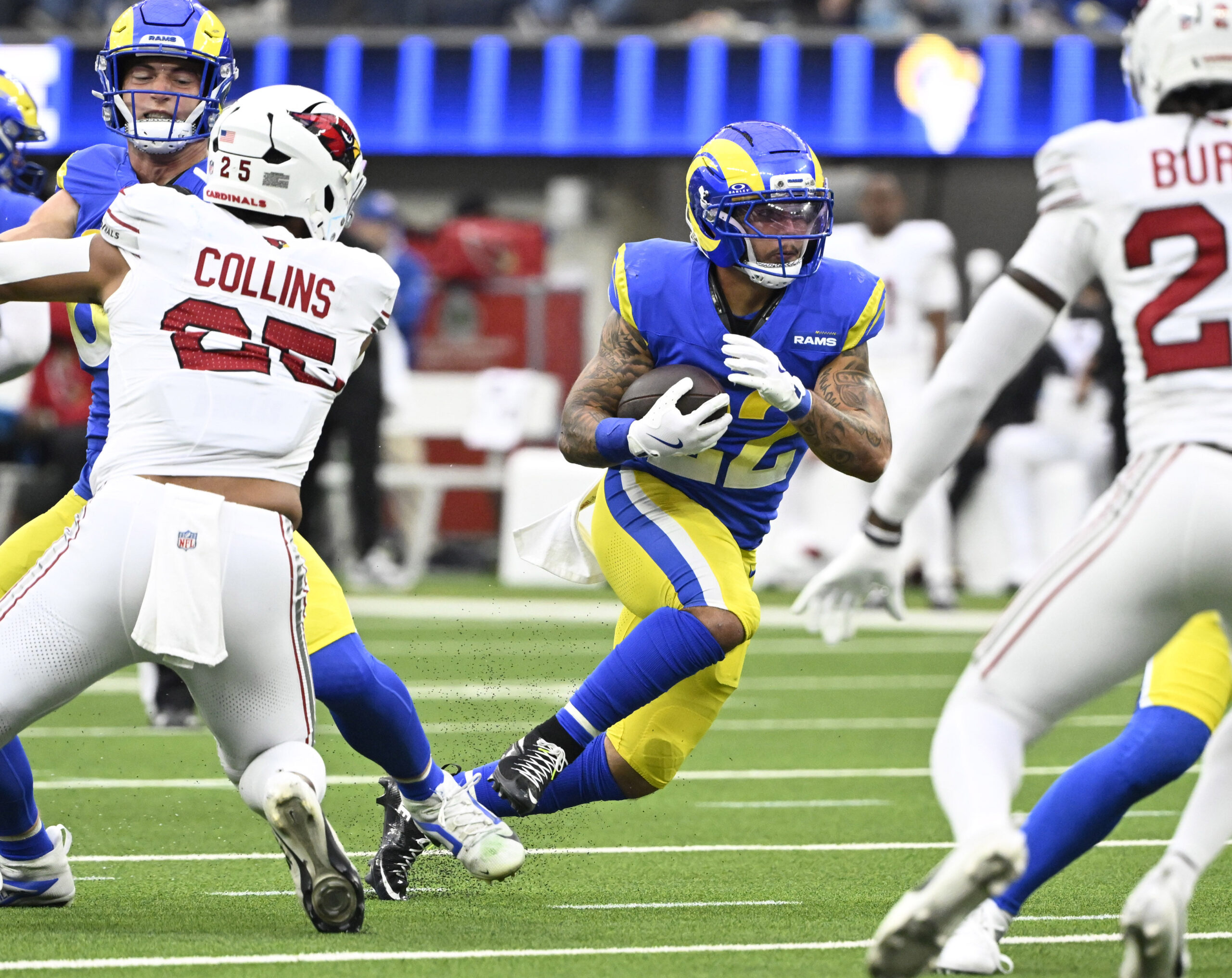 Rams running back Blake Corum #22 runs for a first...