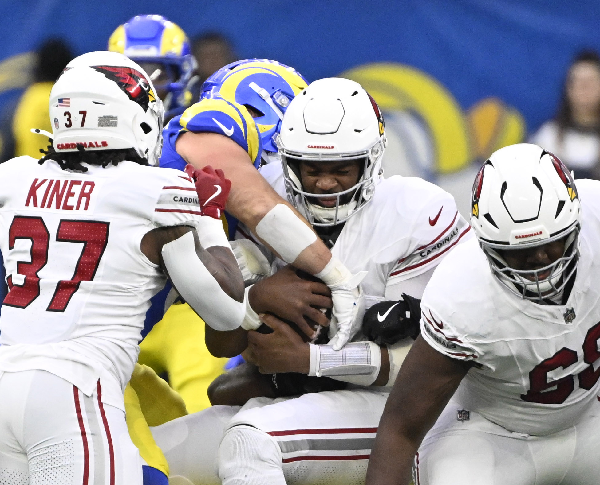 Arizona Cardinals quarterback Jacoby Brissett #7 is sacked by Rams...