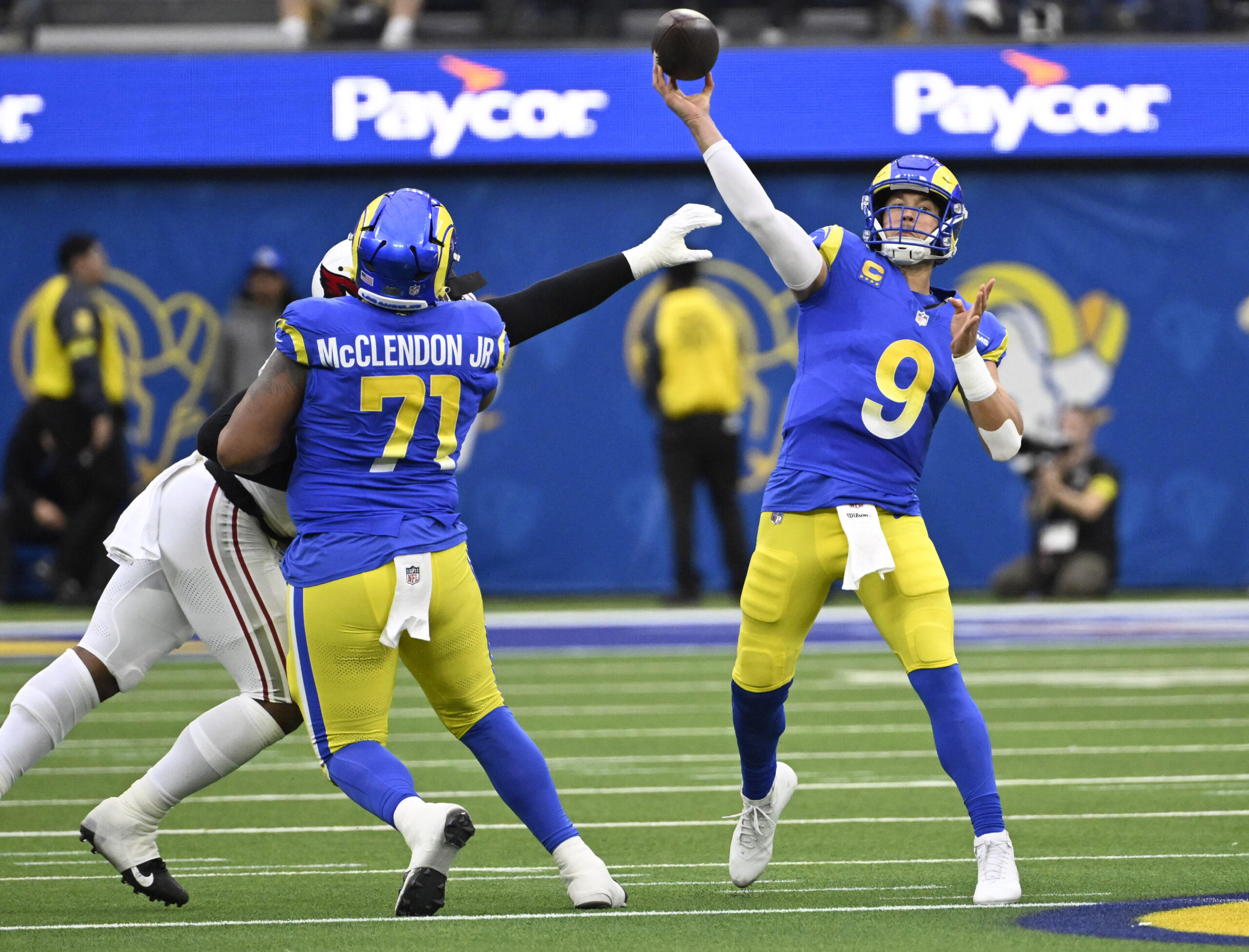 Rams quarterback Matthew Stafford #9 passes against the Arizona Cardinals...