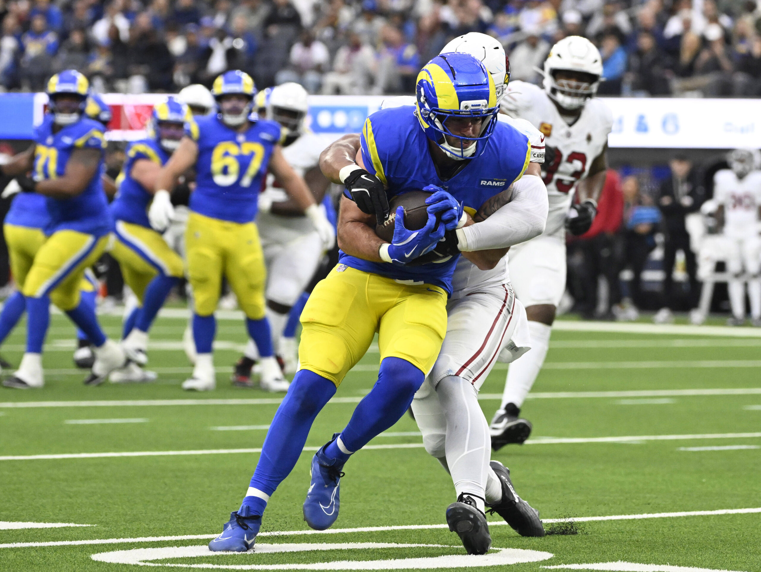 Rams tight end Tyler Higbee #89 catches a pass for...
